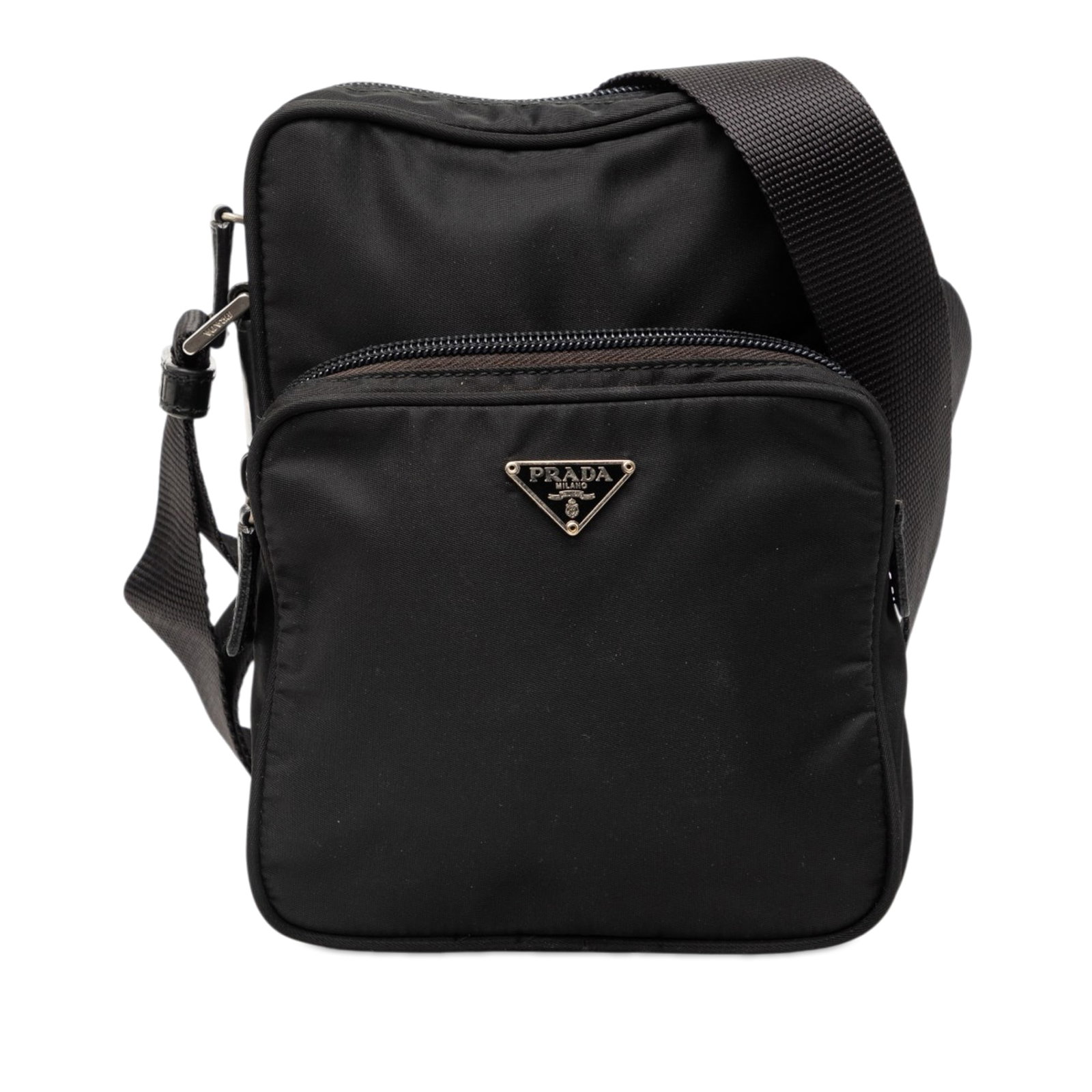Prada Tessuto nylon crossbody bag with zip pocket: Prada Tessuto nylon crossbody bag with zip pocket This Prada Tessuto Zip Top Crossbody bag is crafted from black nylon fabric and features an adjustable flat shoulder strap, a secure top zip closure, 