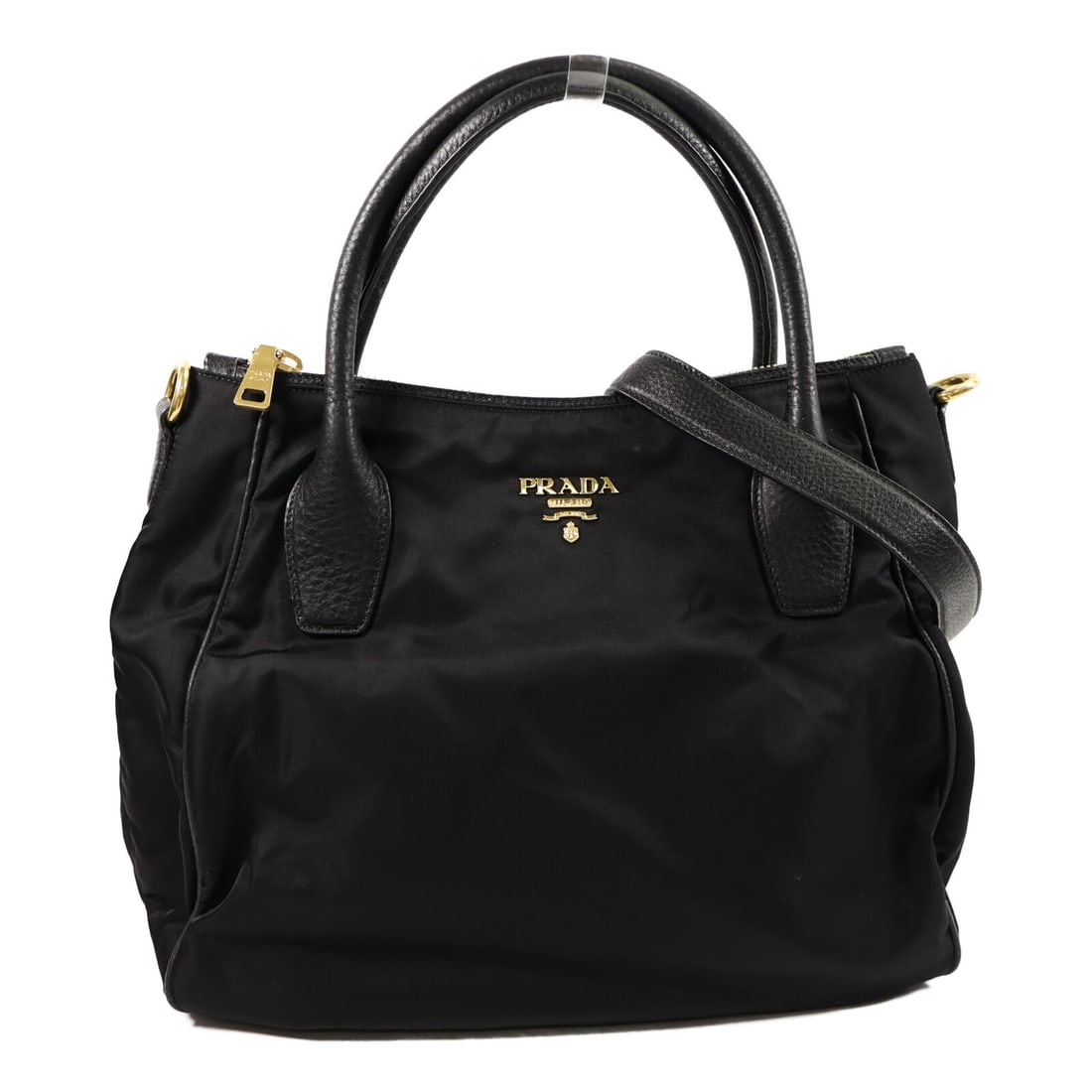 Prada Black Nylon 2Way Shoulder Bag GHW: Prada Black Nylon 2Way Shoulder Bag GHW This PRADA 2-way shoulder bag features a versatile design crafted from durable black nylon. The bag offers both style and practicality, with a spacious interior