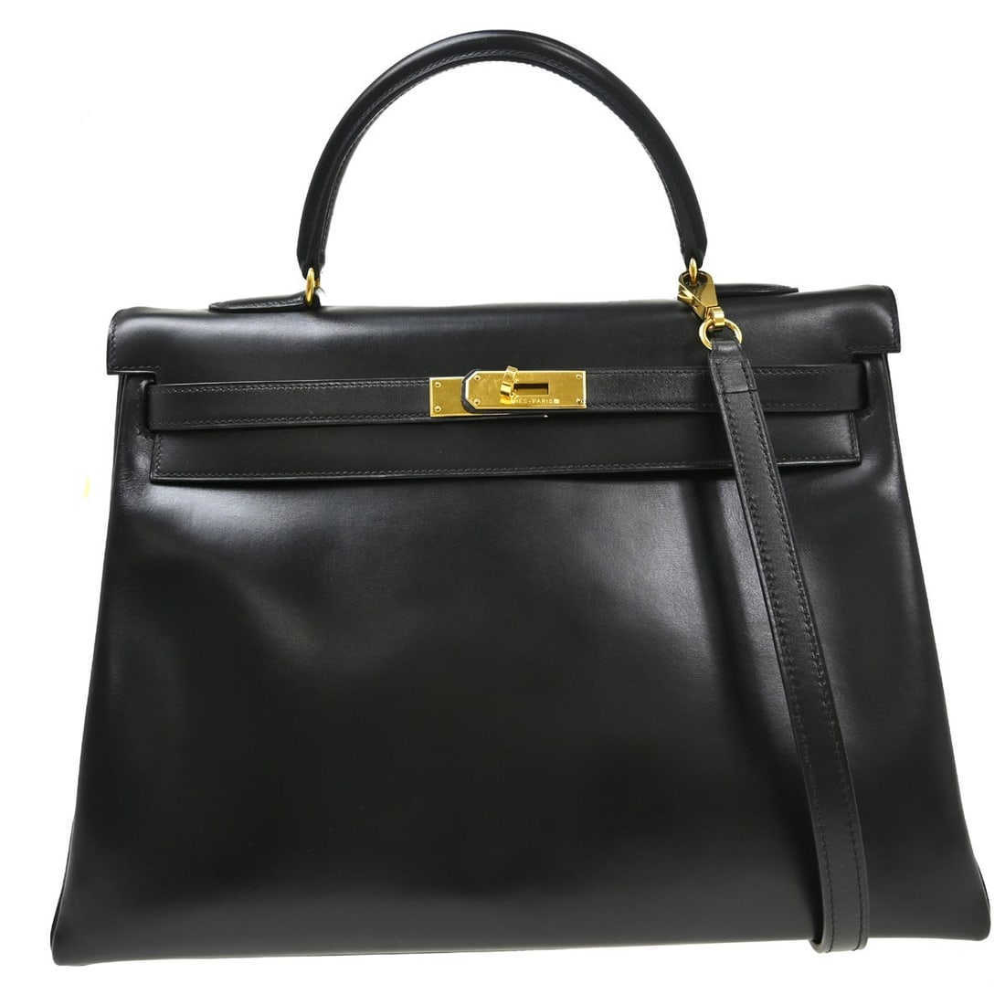 Hermes Kelly black box calf leather gold hardware handbag: Hermes Kelly black box calf leather gold hardware handbag This Hermes Kelly Handbag features a classic black leather exterior complemented by gold hardware. Crafted in France, it is designed for women