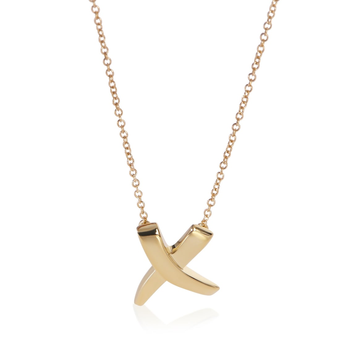 Tiffany & Co Paloma Picasso Grafitti X 18k Yellow Gold Pendant: Tiffany & Co Paloma Picasso Grafitti X 18k Yellow Gold Pendant This Tiffany & Co. Paloma Picasso Graffiti X pendant is crafted from 18k yellow gold and features a sleek, modern design. Made in Italy, 
