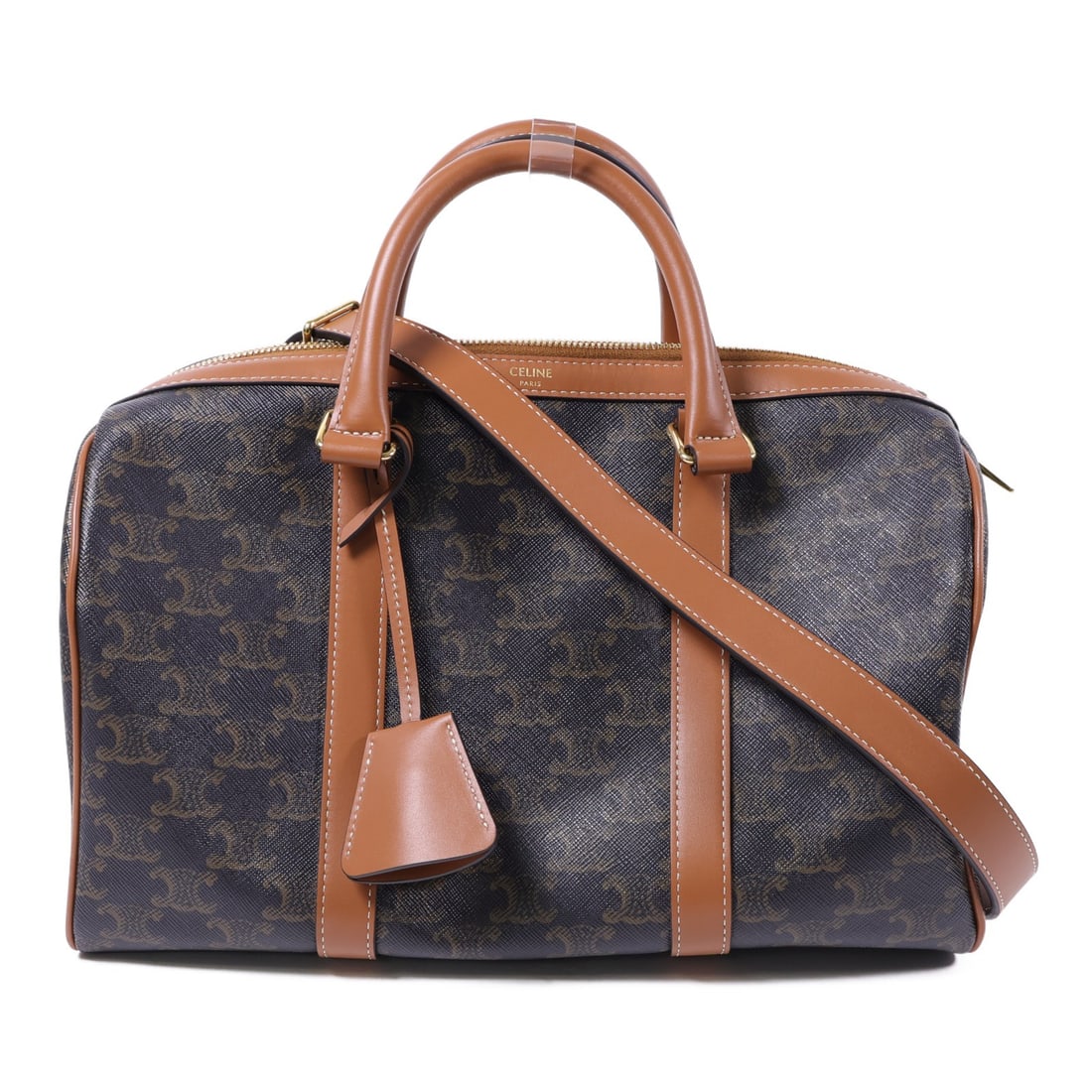 CELINE Triomphe Boston 2way Shoulder Bag PVC Coated Canvas Brown GHW: CELINE Triomphe Boston 2way Shoulder Bag PVC Coated Canvas Brown GHW This CELINE 2-way shoulder bag features the iconic Triomphe design and is crafted from PVC coated canvas in brown. The bag offers v