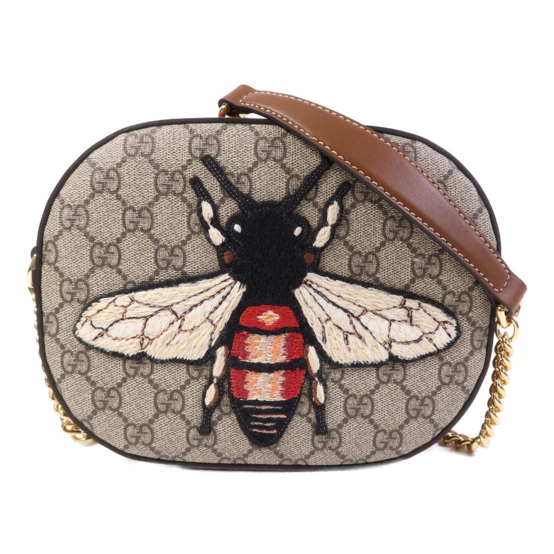 Gucci 409535 Brown PVC Coated Canvas Shoulder Bag GHW: Gucci 409535 Brown PVC Coated Canvas Shoulder Bag GHW This Gucci shoulder bag features a classic brown PVC coated canvas exterior and gold-tone hardware. Designed for women, it offers a compact and ve