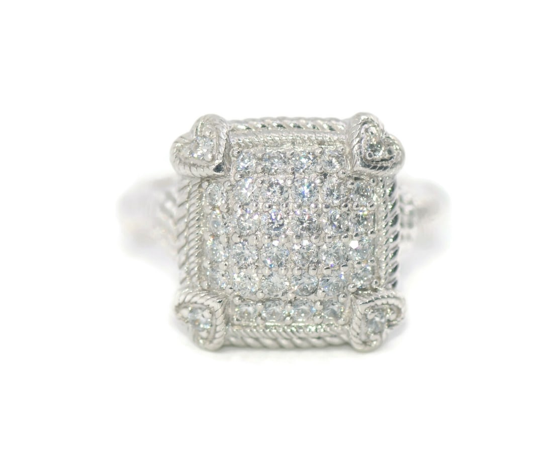 Judith Ripka Sterling Silver Ring Size 7 with Cubic Zirconia: Judith Ripka Sterling Silver Ring Size 7 with Cubic Zirconia This exquisite Judith Ripka ring features a stunning design crafted from high-quality sterling silver. Measuring a size 7, the ring showcas