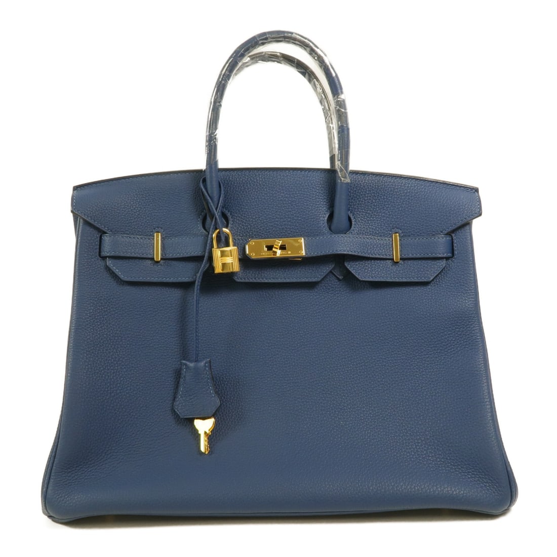Hermes Birkin 35 Deep Blue Togo Leather Handbag GHW: Hermes Birkin 35 Deep Blue Togo Leather Handbag GHW This Hermes Birkin 35 handbag features deep blue Togo calfskin leather and gold-tone hardware. Crafted in France, it offers a spacious and elegant d