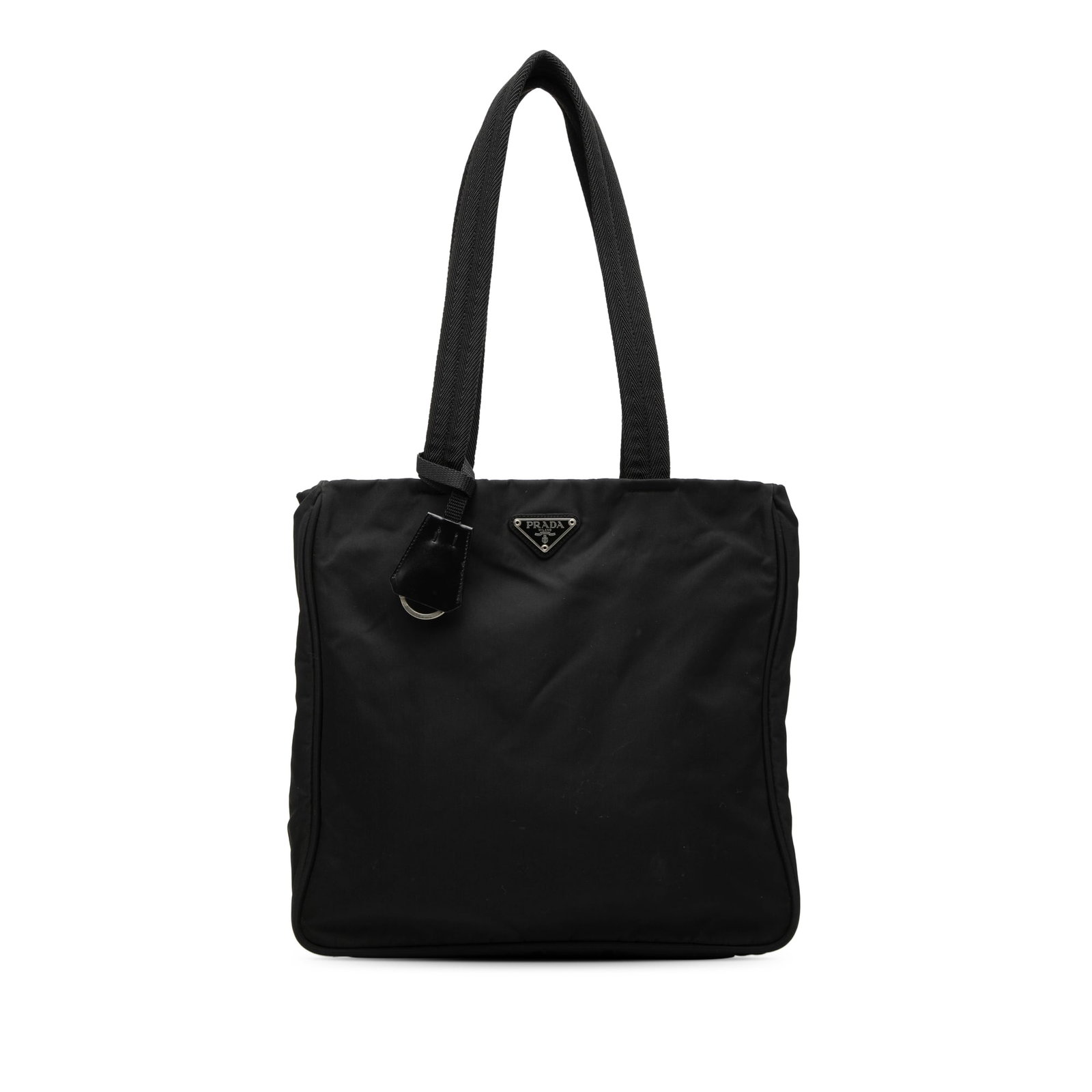 Prada Tessuto Tote Black Nylon Leather Trim Bag: Prada Tessuto Tote Black Nylon Leather Trim Bag This Prada Tessuto Tote is crafted from durable nylon with leather trim, featuring flat shoulder straps for comfortable carrying. The open top design pr