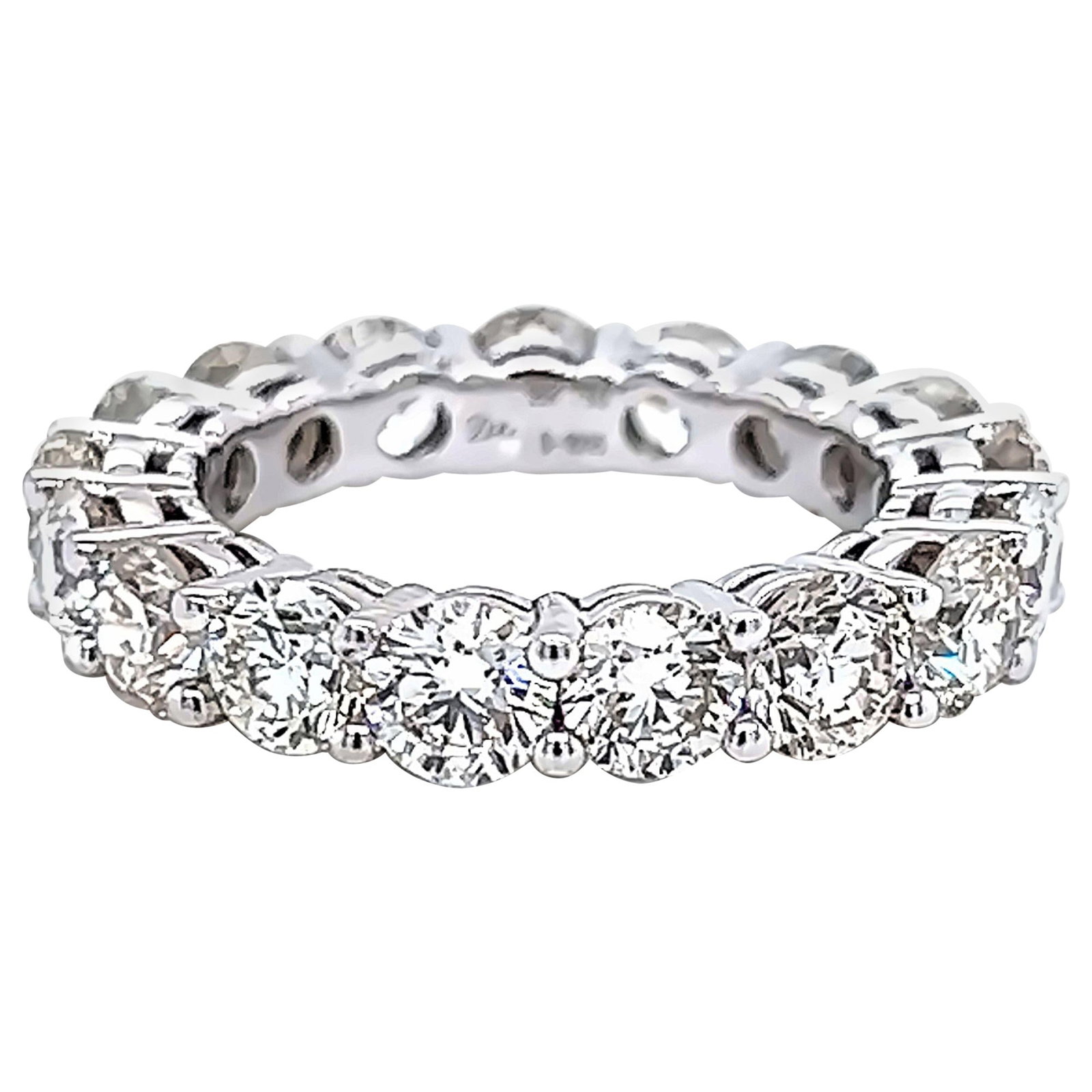 5.17ct Round Diamond Eternity Band 18k White Gold: 5.17ct Round Diamond Eternity Band 18k White Gold This exquisite diamond eternity band features 17 round brilliant diamonds totaling 5.17 carats, showcasing approximately G/H color and VS clarity. Set