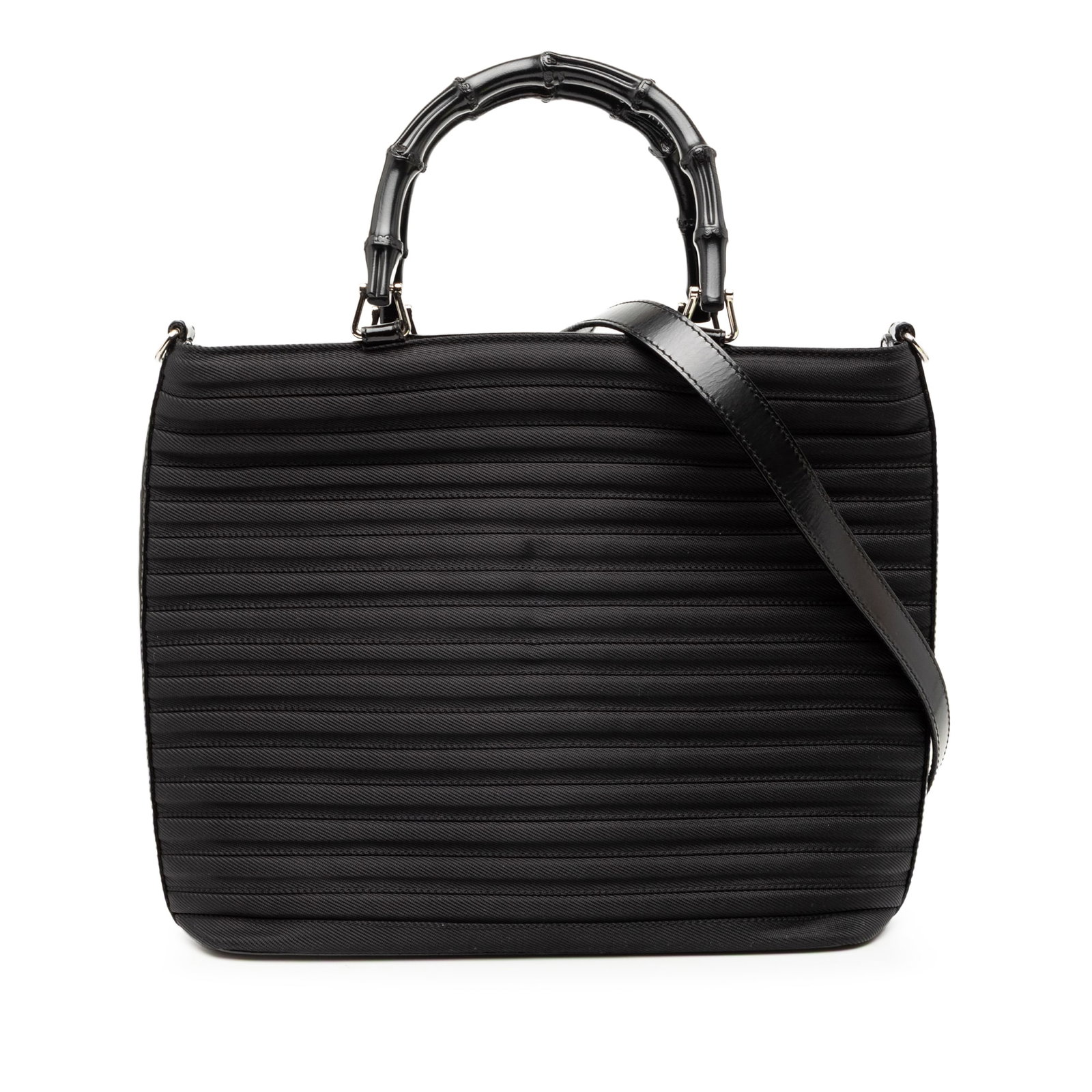 Black Quilted Nylon Satchel with Bamboo Handles and Leather Strap by Gucci: Black Quilted Nylon Satchel with Bamboo Handles and Leather Strap by Gucci This Gucci Nylon Bamboo Satchel features a quilted nylon body in black, distinctive bamboo top handles, a detachable flat lea
