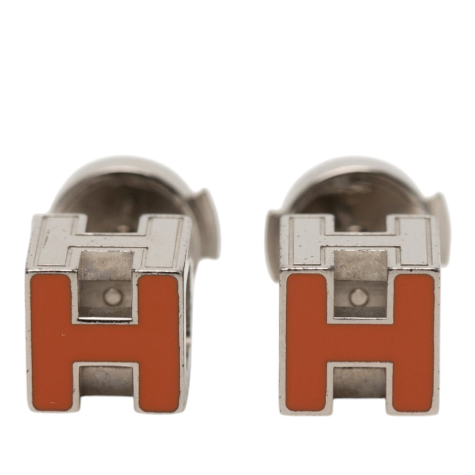 Hermes cage dH earrings palladium plated lacquered metal: Hermes cage dH earrings palladium plated lacquered metal These Hermes earrings feature palladium-plated metal bodies with lacquer details and are designed with push back closures. Made in France, they