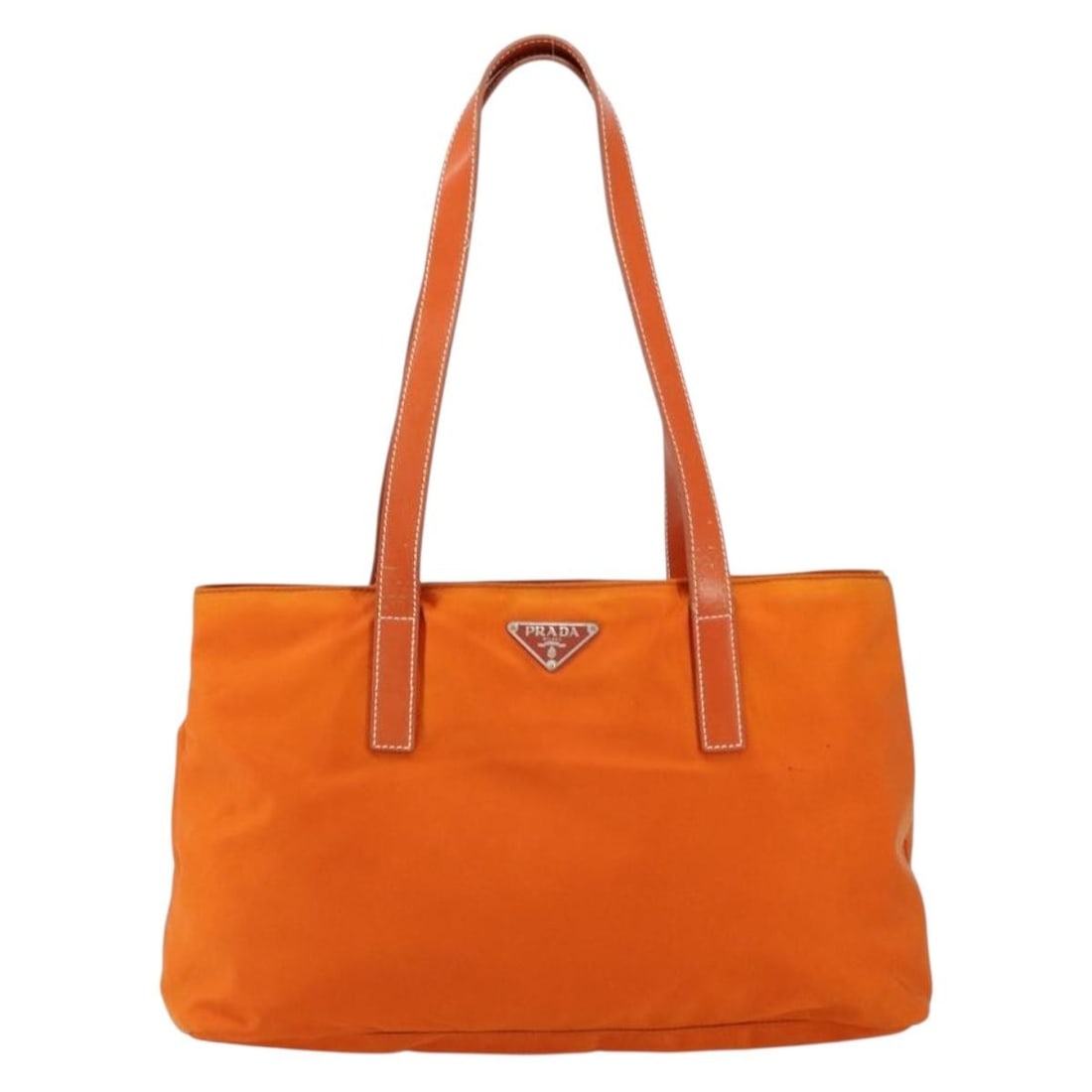 Prada Tessuto Orange Nylon Vintage Tote Bag: Prada Tessuto Orange Nylon Vintage Tote Bag This Prada Vintage Tote is crafted from orange nylon and features a classic design. The bag is designed for women and offers ample space for essentials. It 