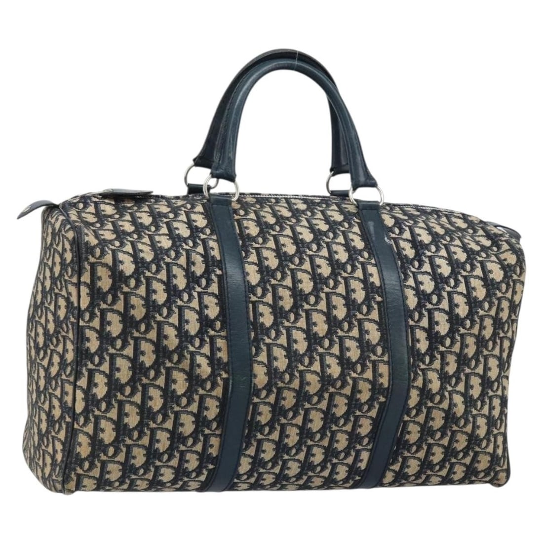 Christian Dior Trotter Boston Bag Navy Canvas: Christian Dior Trotter Boston Bag Navy Canvas This Christian Dior Vintage Trotter Boston Bag features the iconic Diorissimo canvas in navy. Designed for unisex use, the bag offers a spacious interior 