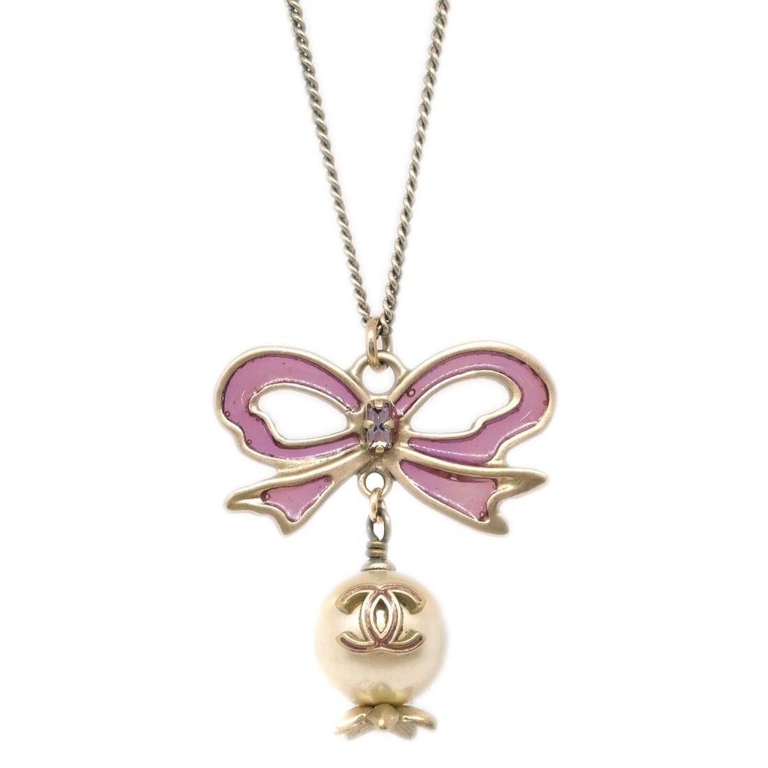 Chanel 05A Gold-Plated Bow Charm Necklace with Artificial Pearls: Chanel 05A Gold-Plated Bow Charm Necklace with Artificial Pearls Elevate your style with this exquisite Chanel Chain Pendant Necklace, featuring a charming bow design. Crafted with a gold-plated finis