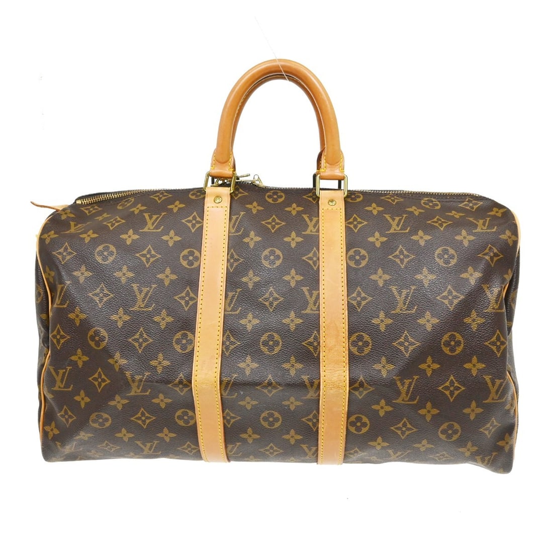 Louis Vuitton Keepall canvas travel bag: Louis Vuitton Keepall canvas travel bag This Louis Vuitton Keepall Bag features the iconic monogram canvas in brown and is designed for unisex use. Made in France, the bag shows visible signs of wear,