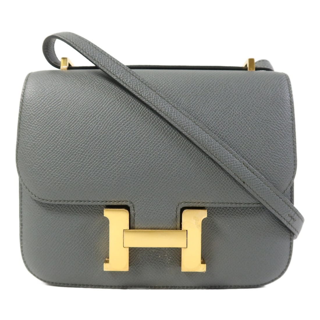 Hermes Constance Mini Blue Epsom Leather Shoulder Bag with Gold Hardware: Hermes Constance Mini Blue Epsom Leather Shoulder Bag with Gold Hardware This Hermes Constance Mini shoulder bag is crafted from Epsom calfskin leather in a blue hue and features gold hardware. Design