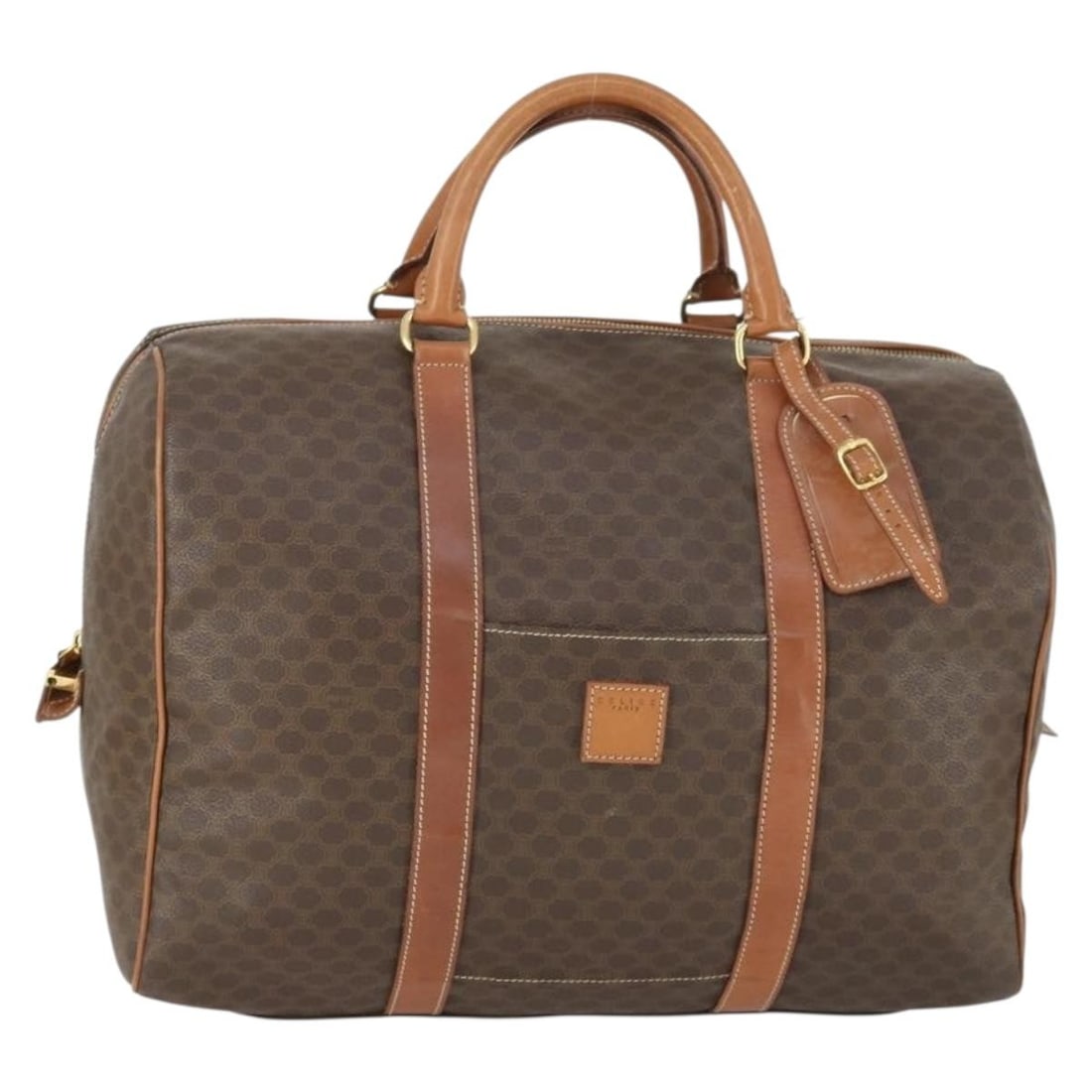Brown Gold Macadam Canvas Boston Bag by CELINE PVC Leather: Brown Gold Macadam Canvas Boston Bag by CELINE PVC Leather This CELINE Boston Bag features a combination of brown Macadam canvas and PVC leather with gold-tone hardware. Designed in Italy, the bag mea