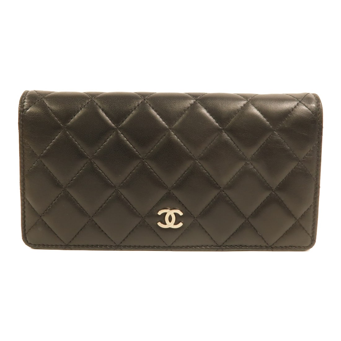 CHANEL Black Lambskin CC Long Wallet A31509: CHANEL Black Lambskin CC Long Wallet A31509 This Chanel CC SHW long wallet is crafted from luxurious black lambskin leather and features a bifold design. Designed for women, it offers both style and f