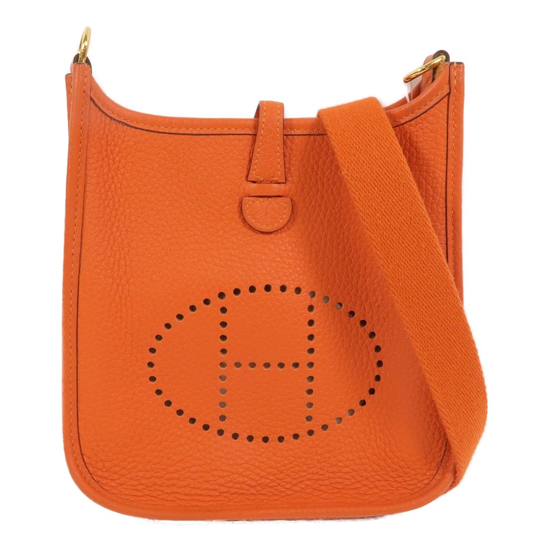 Hermes Evelyne TPM Orange Taurillon Clemence Shoulder Bag GHW: Hermes Evelyne TPM Orange Taurillon Clemence Shoulder Bag GHW This Hermes Evelyne TPM shoulder bag is crafted from Taurillon Clemence calfskin leather in a vibrant orange color. Designed for women, it