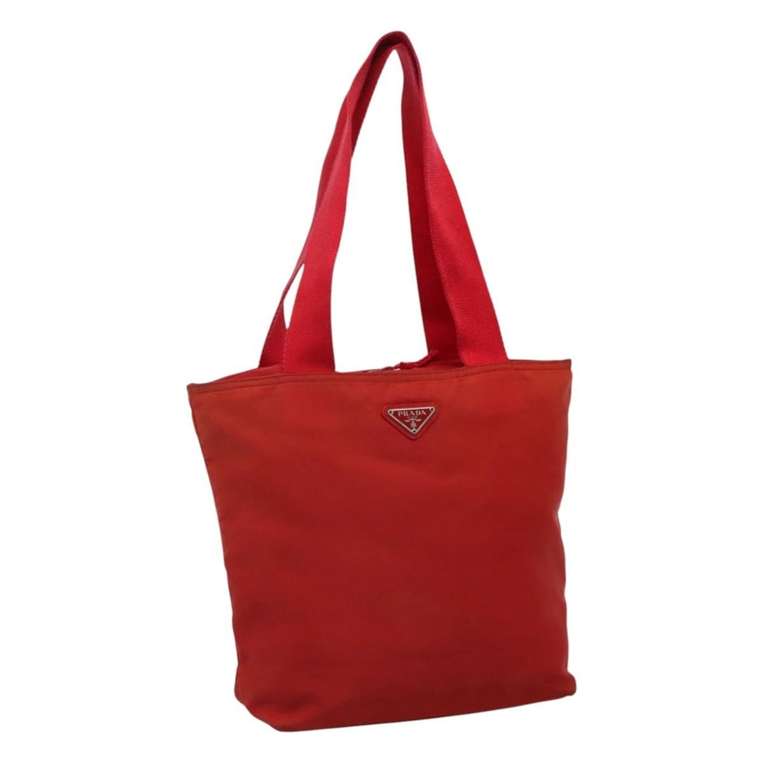 Red Nylon Tote by Prada Women's Italian Designer Handbag: Red Nylon Tote by Prada Women's Italian Designer Handbag This PRADA tote bag is crafted from red nylon and designed for women. The bag features a spacious interior, making it practical for daily use. 