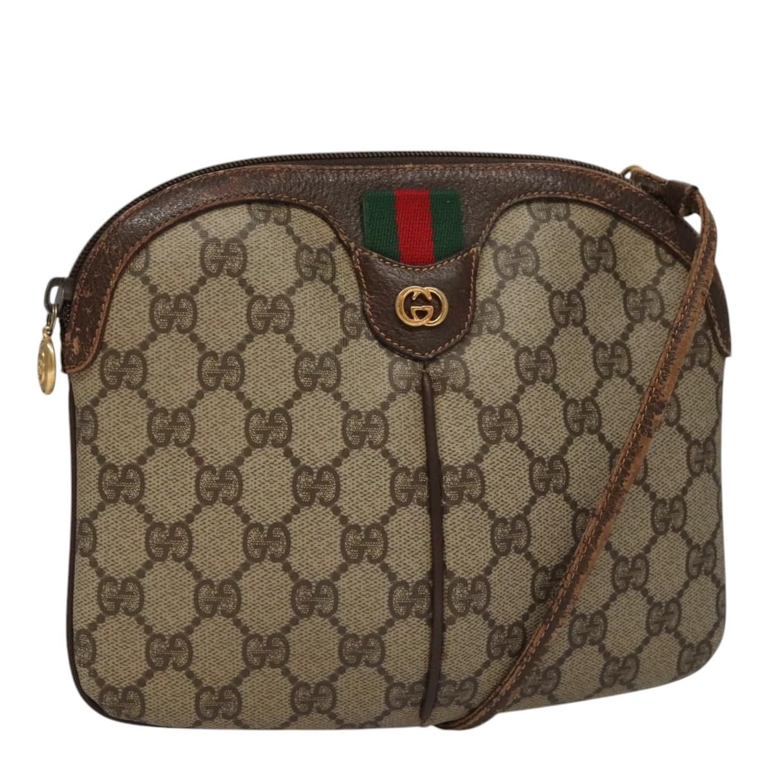 Gucci GG Supreme beige gold shoulder bag Italy 19.7 inch strap: Gucci GG Supreme beige gold shoulder bag Italy 19.7 inch strap This GUCCI Web Sherry Line GG Supreme shoulder bag features a beige and gold design crafted from PVC leather and GG canvas. Made in Italy