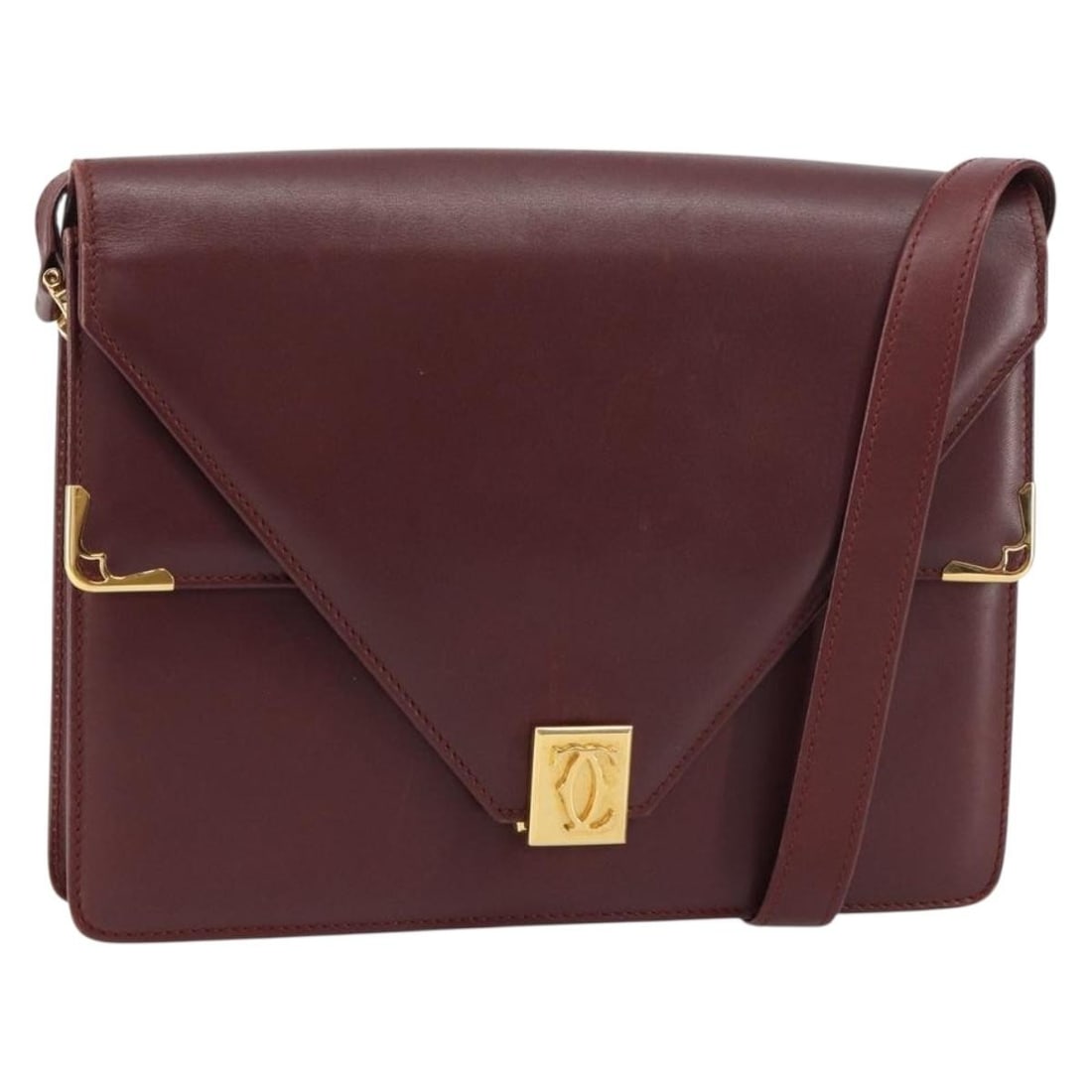 Cartier Must Line Bordeaux Leather Shoulder Bag Gold Tone Hardware: Cartier Must Line Bordeaux Leather Shoulder Bag Gold Tone Hardware This is an authentic Cartier Must Line shoulder bag crafted from bordeaux leather with gold-tone accents. The bag features a structur
