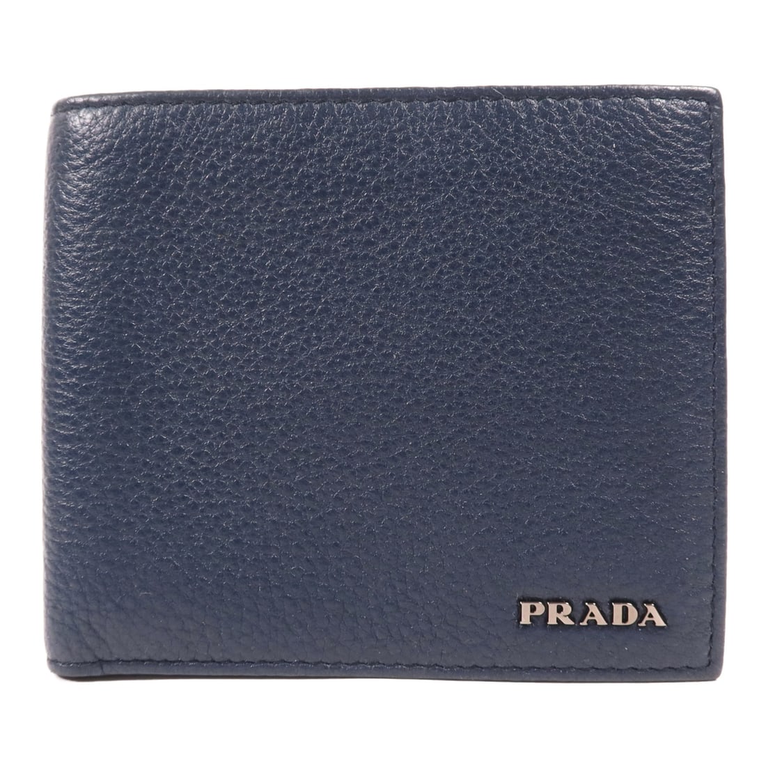 PRADA navy calfskin bi-fold wallet: PRADA navy calfskin bi-fold wallet This PRADA bi-fold wallet is crafted from premium calfskin leather in a sophisticated navy color. Designed for functionality and style, it features a regular size pe