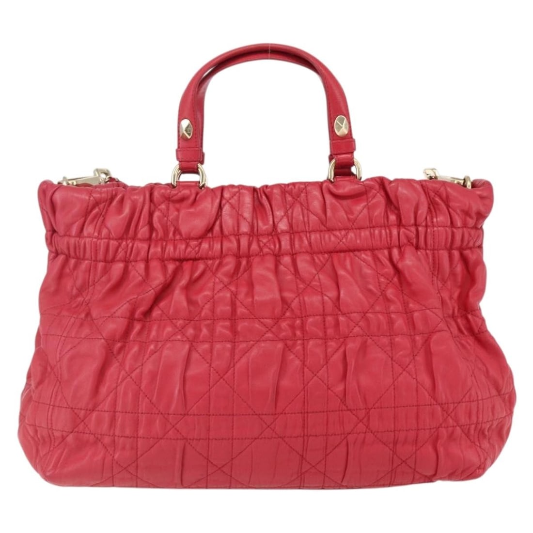 Red Leather Delices Tote by Christian Dior 31cm by 24cm by 9cm: Red Leather Delices Tote by Christian Dior 31cm by 24cm by 9cm Christian Dior Delices Tote in red leather designed for women. This Italian-made handbag features a quilted Cannage pattern and includes 