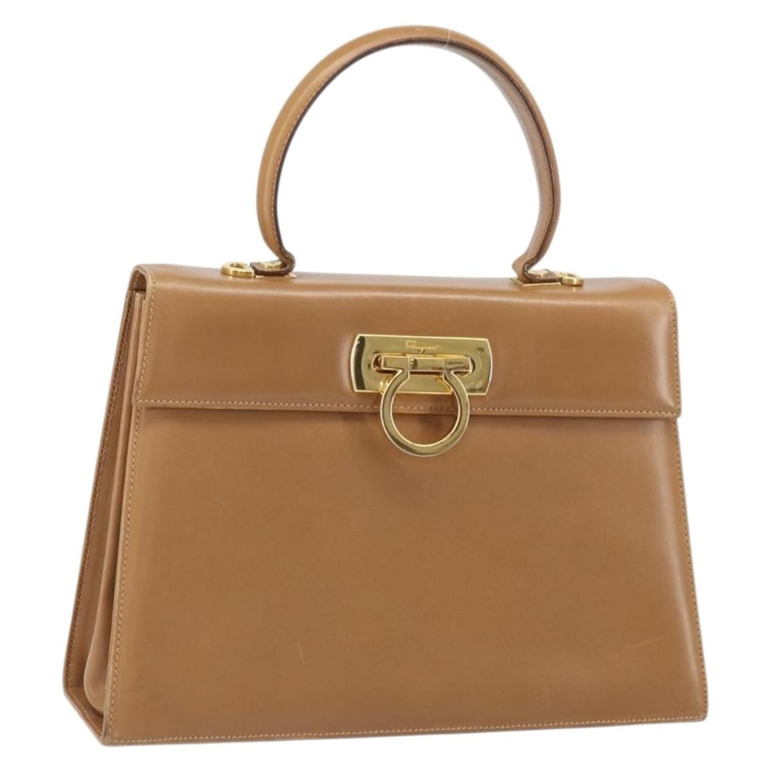 Brown Leather Gancini Handbag by Salvatore Ferragamo Gold Accents: Brown Leather Gancini Handbag by Salvatore Ferragamo Gold Accents This Salvatore Ferragamo Gancini handbag is crafted from brown leather with gold-tone accents. Designed for women, it features a struc