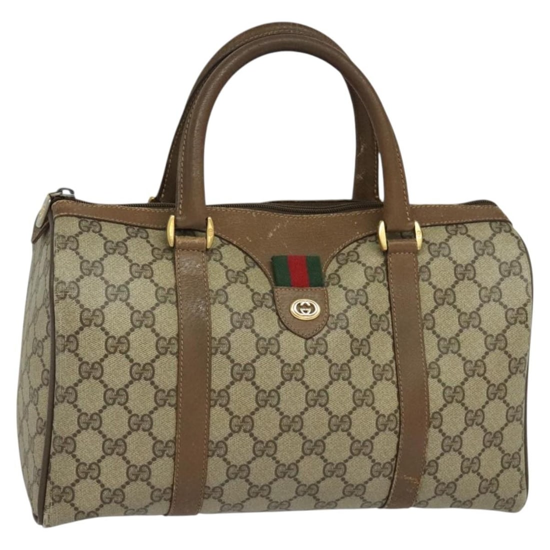 Beige GG Canvas Boston Bag by Gucci with Gold Accents 40 02 007: Beige GG Canvas Boston Bag by Gucci with Gold Accents 40 02 007 This is a Gucci GG Supreme Web Sherry Line Boston Bag crafted from GG canvas in beige and gold tones. Designed for women, this Boston ba