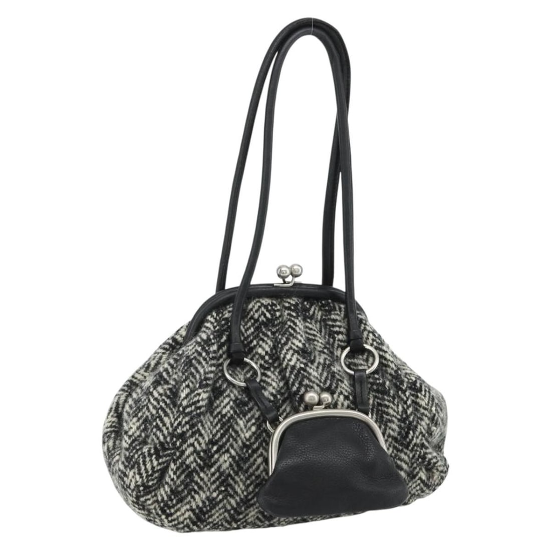 Miu Miu Black Silver Canvas Shoulder Bag with Pouch: Miu Miu Black Silver Canvas Shoulder Bag with Pouch This Miu Miu shoulder bag features a stylish black and silver tweed canvas exterior. Designed for women, it offers a compact silhouette with a pract