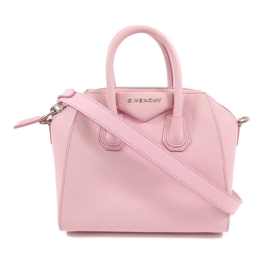 Pink Calfskin Givenchy Antigona Mini Shoulder Bag: Pink Calfskin Givenchy Antigona Mini Shoulder Bag This Givenchy Antigona Mini 2-Way Shoulder Bag is crafted from pink calfskin leather and features a versatile design that can be worn as a shoulder ba