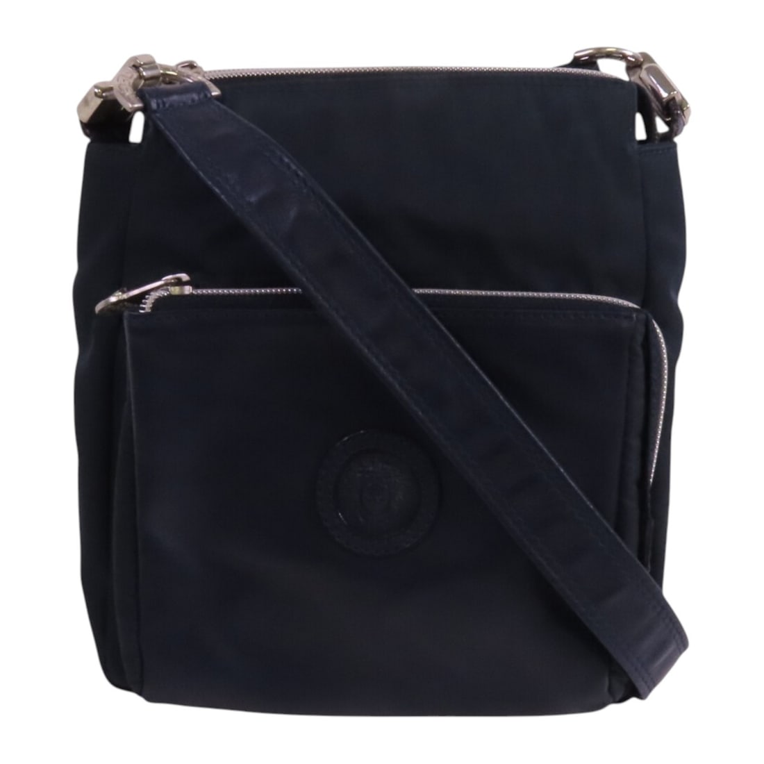 Versace navy nylon shoulder bag crossbody women: Versace navy nylon shoulder bag crossbody women This Versace shoulder bag features a navy nylon exterior, offering a sleek and durable design. The bag is sized for everyday use and can be worn as a cr