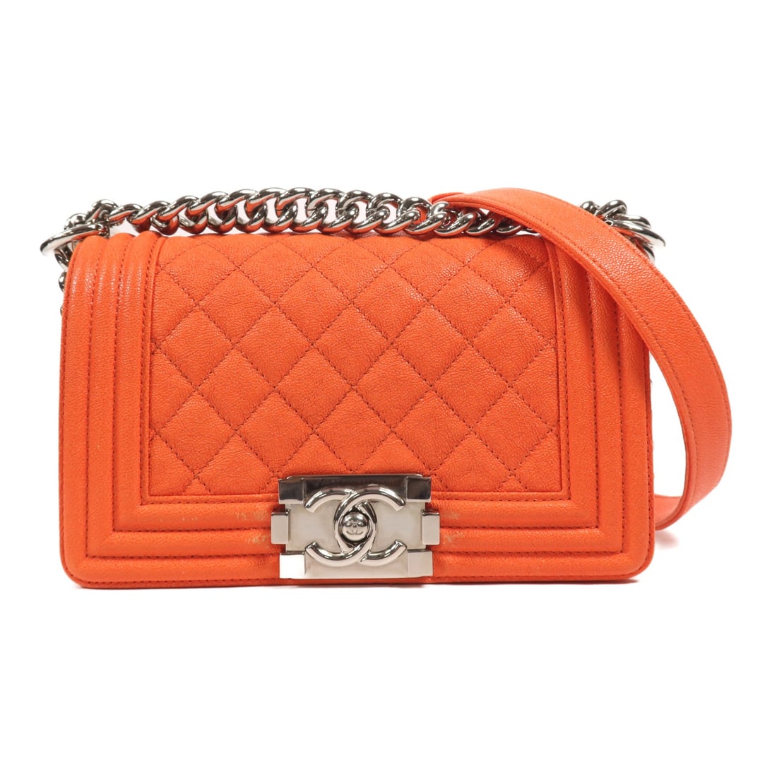 CHANEL Boy 20 Orange Calfskin Shoulder Bag: CHANEL Boy 20 Orange Calfskin Shoulder Bag This CHANEL Boy 20 shoulder bag features premium orange calfskin leather with silver-tone hardware. Designed for women, the bag offers a compact yet function