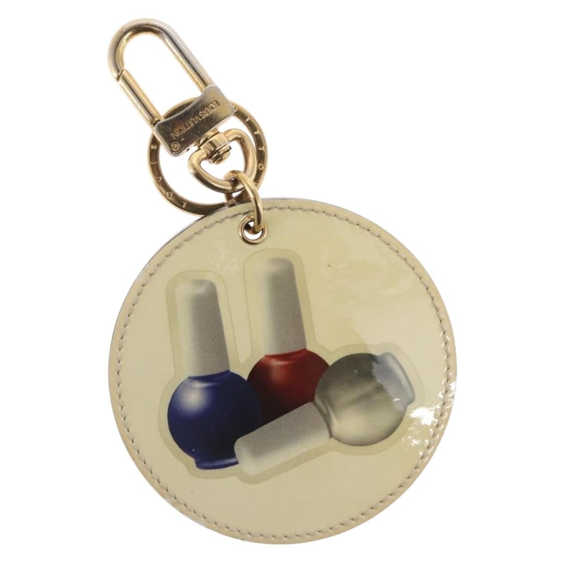 Beige Patent Leather Illustre Nail Polish Charm by Louis Vuitton MP1570: Beige Patent Leather Illustre Nail Polish Charm by Louis Vuitton MP1570 This is a Louis Vuitton Illustre Nail Polish charm, crafted from beige patent leather with gold-tone accents. The charm is desig