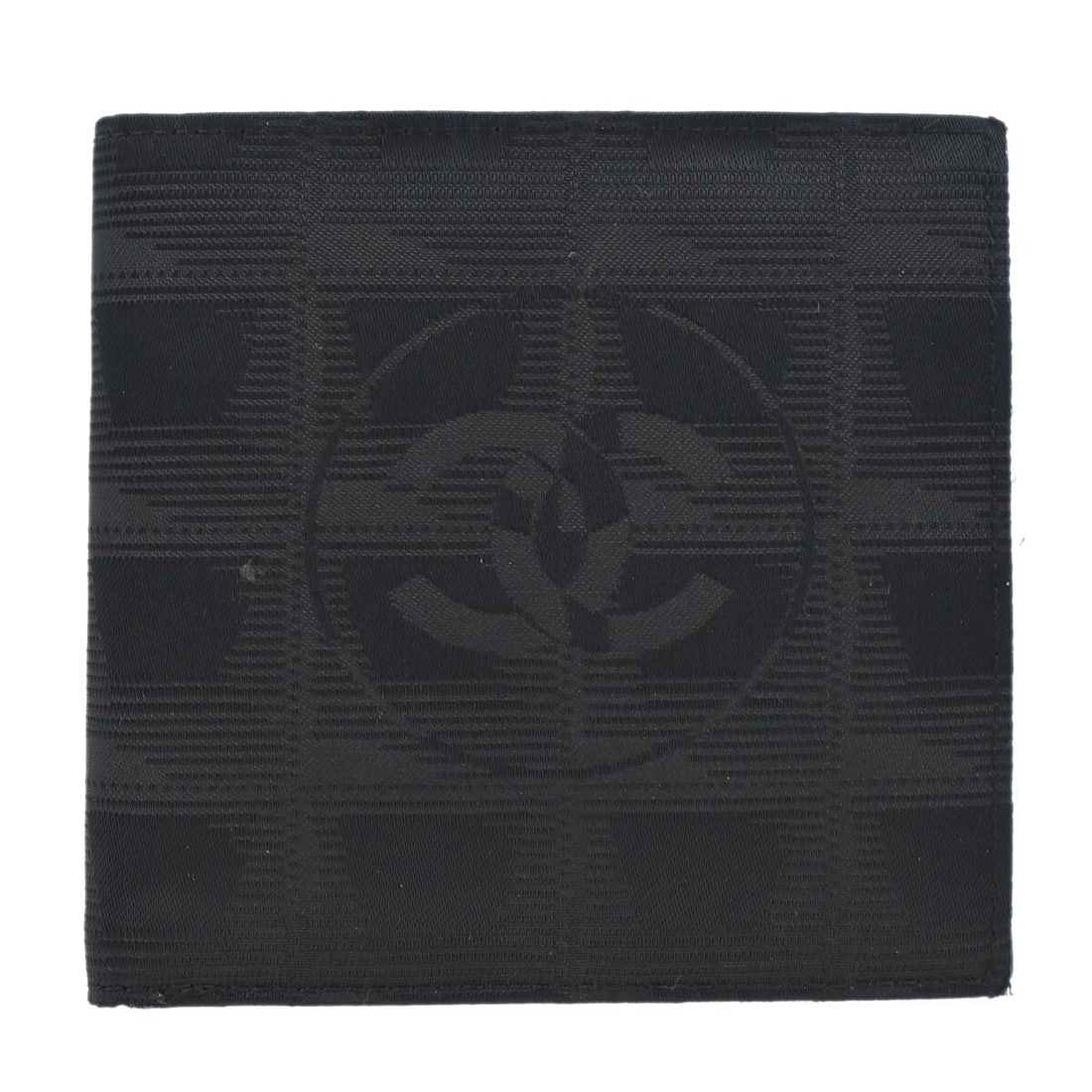 Chanel Travel Line Black Nylon Women's Bifold Wallet France 4": Chanel Travel Line Black Nylon Women's Bifold Wallet France 4" This Chanel Travel Line bifold wallet is crafted from black nylon and features a compact, square design. Made in France, it is designed f