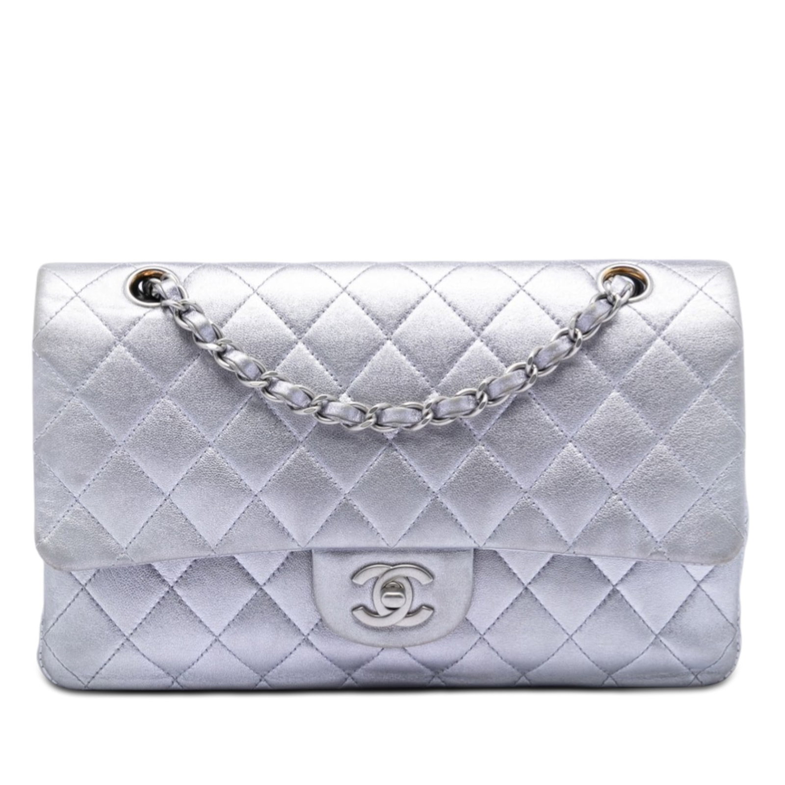 Chanel metallic lambskin flap bag with chain strap: Chanel metallic lambskin flap bag with chain strap This Chanel Medium Classic Metallic Lambskin Double Flap bag features a quilted metallic lambskin leather exterior in purple, complemented by a leath