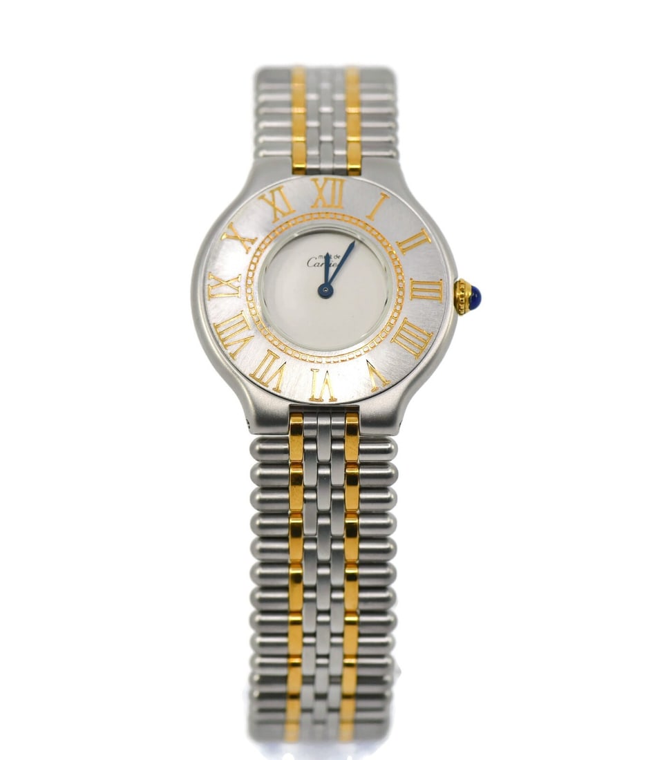 Cartier Must 21 Two Tone Stainless Steel Watch Ref 123000 with Box: Cartier Must 21 Two Tone Stainless Steel Watch Ref 123000 with Box This Cartier Must 21 Two Tone Stainless Steel Watch combines elegance and functionality with its sleek design. Featuring a quartz mov