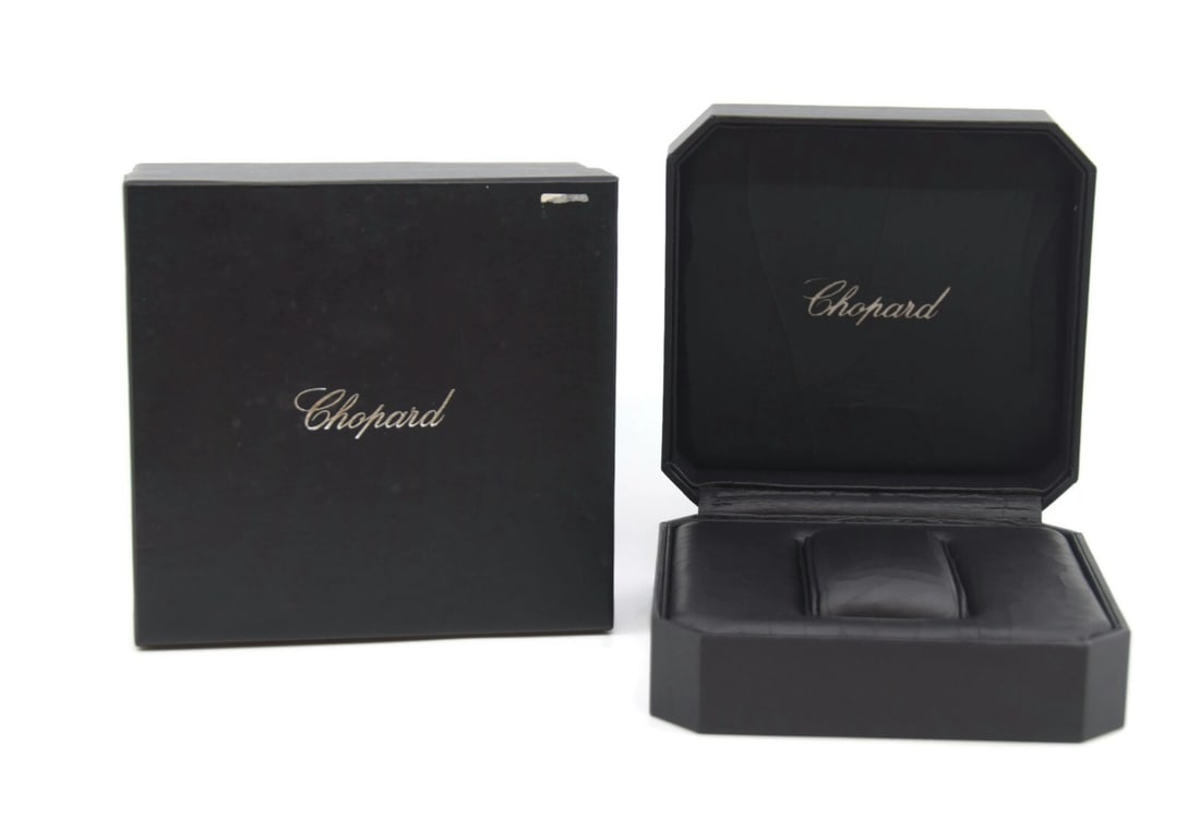 Chopard Elton John Watch Presentation Box Black 5x5x2 Inches 100% Authentic: Chopard Elton John Watch Presentation Box Black 5x5x2 Inches 100% Authentic This Chopard Elton John Watch Box is a sophisticated presentation box crafted from durable paper and cardboard. Its elegant 