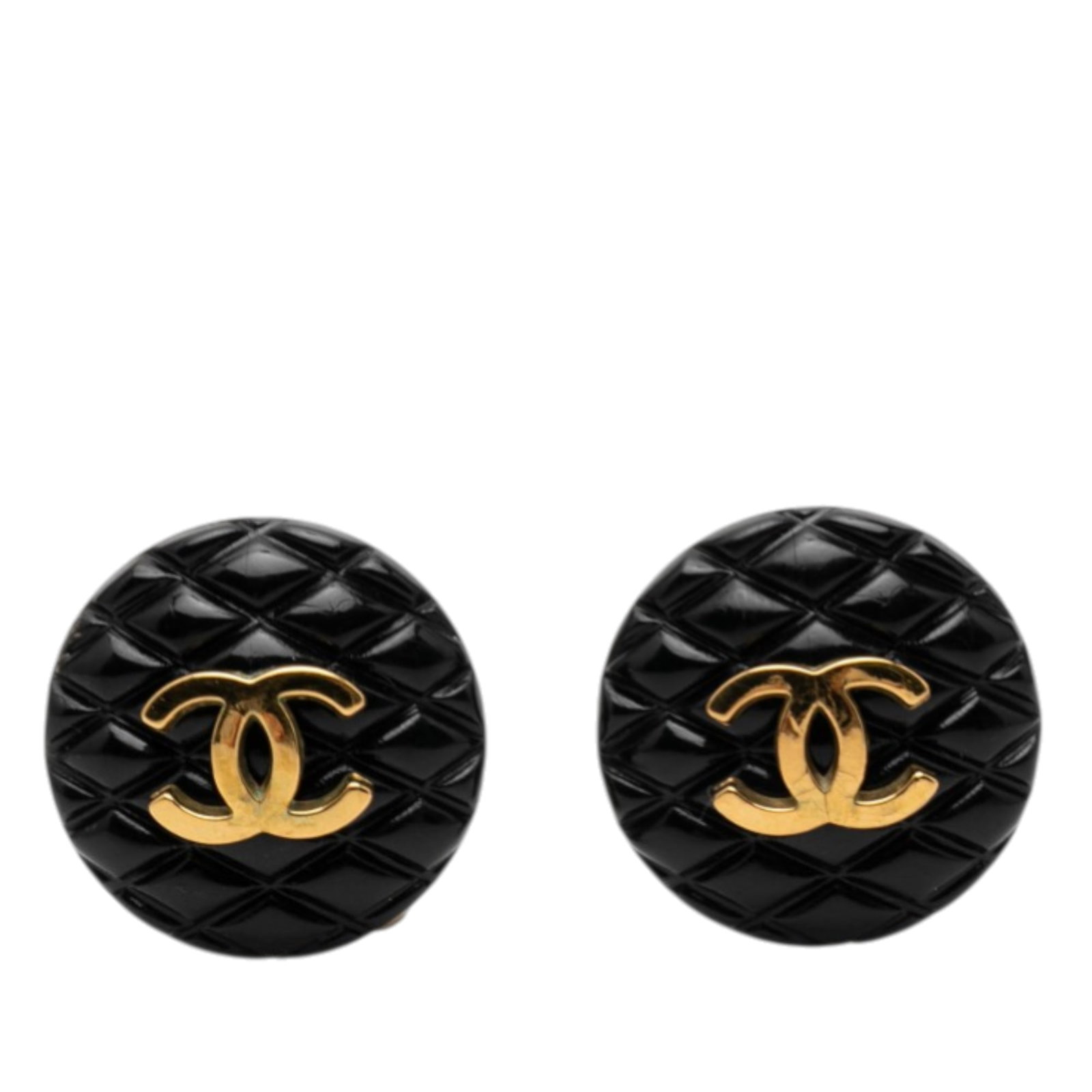 Chanel Quilted Black Resin Button Earrings with Gold Plated CC Logo Clip On: Chanel Quilted Black Resin Button Earrings with Gold Plated CC Logo Clip On These Chanel earrings feature a quilted black resin body adorned with gold-plated CC details and clip-on closures. Designed 