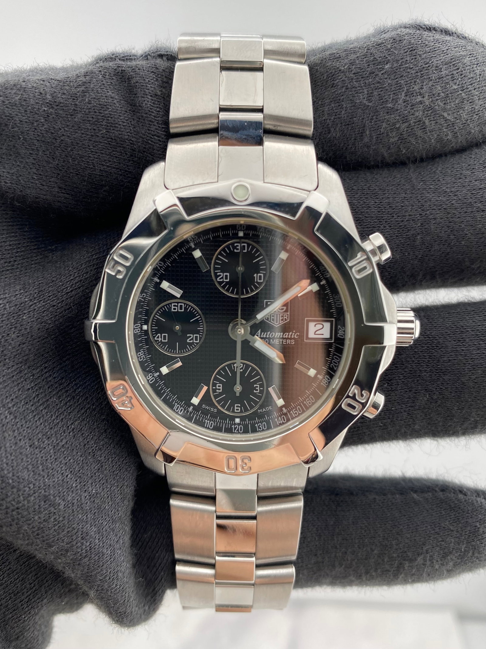 Tag Heuer Aquagraph 41mm Black Dial Stainless Steel Card: Tag Heuer Aquagraph 41mm Black Dial Stainless Steel Card This Tag Heuer Aquagraph features a black dial and comes on reference CN2111.BA0361. The watch is crafted from stainless steel and has a 41mm c