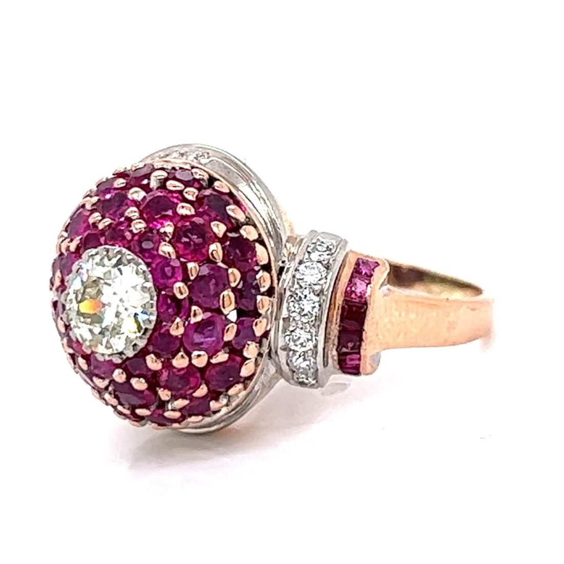 Vintage 14K Rose Gold Platinum Burma Ruby Diamond Ring: Vintage 14K Rose Gold Platinum Burma Ruby Diamond Ring This exquisite Retro ring showcases a stunning combination of 14K rose gold and platinum, adorned with a striking Burma ruby centerpiece and a to