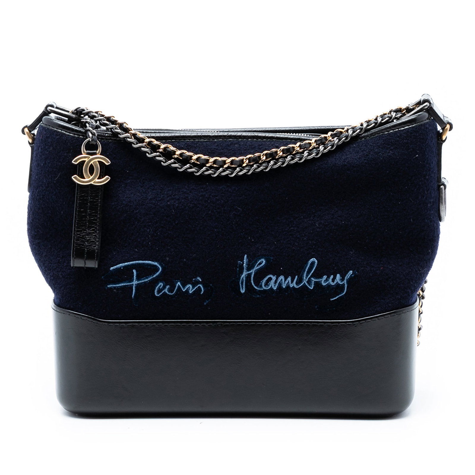 Chanel Gabrielle Hobo Wool Embroidered Blue Medium: Chanel Gabrielle Hobo Wool Embroidered Blue Medium This Chanel Medium Wool Paris Hamburg Embroidered Gabrielle Hobo features a blue embroidered wool body with a structured leather base, complemented b
