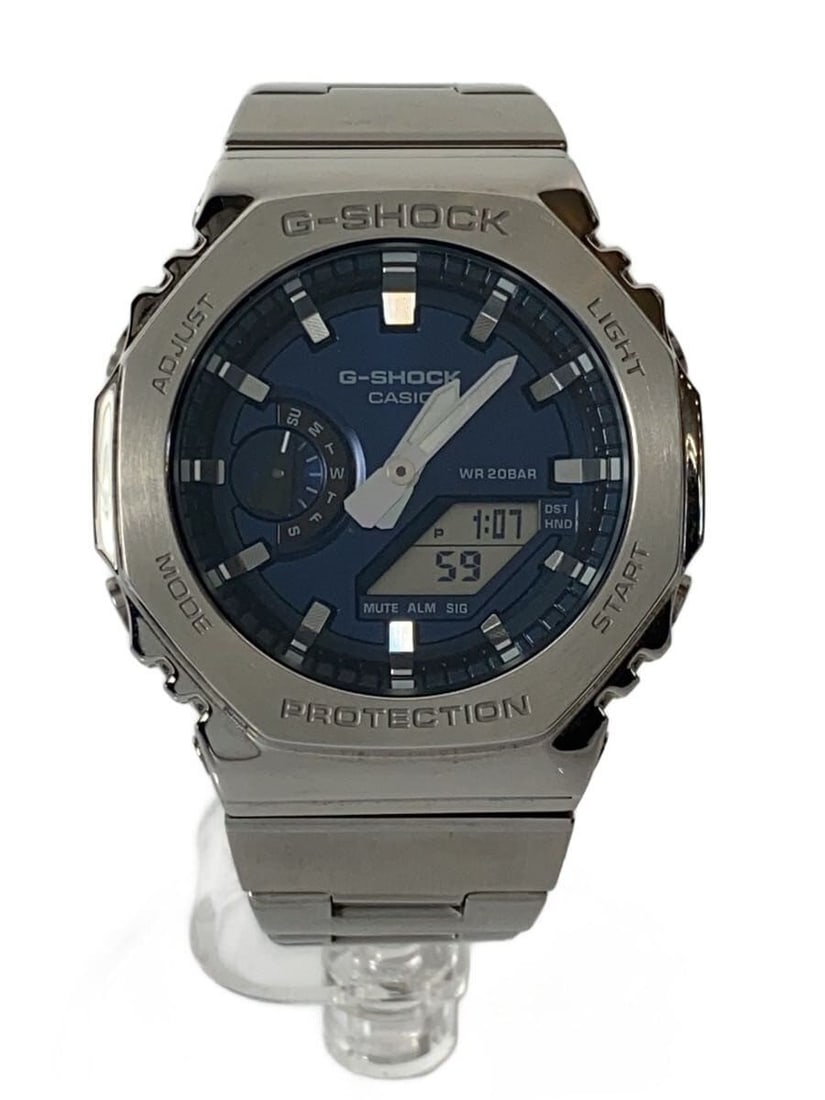 CASIO GM-2110D-2BJF stainless steel navy wristwatch: CASIO GM-2110D-2BJF stainless steel navy wristwatch This CASIO G-SHOCK Metal Covered Model GM-2110D-2BJF is a men's wristwatch featuring a durable stainless steel construction and a navy color scheme.