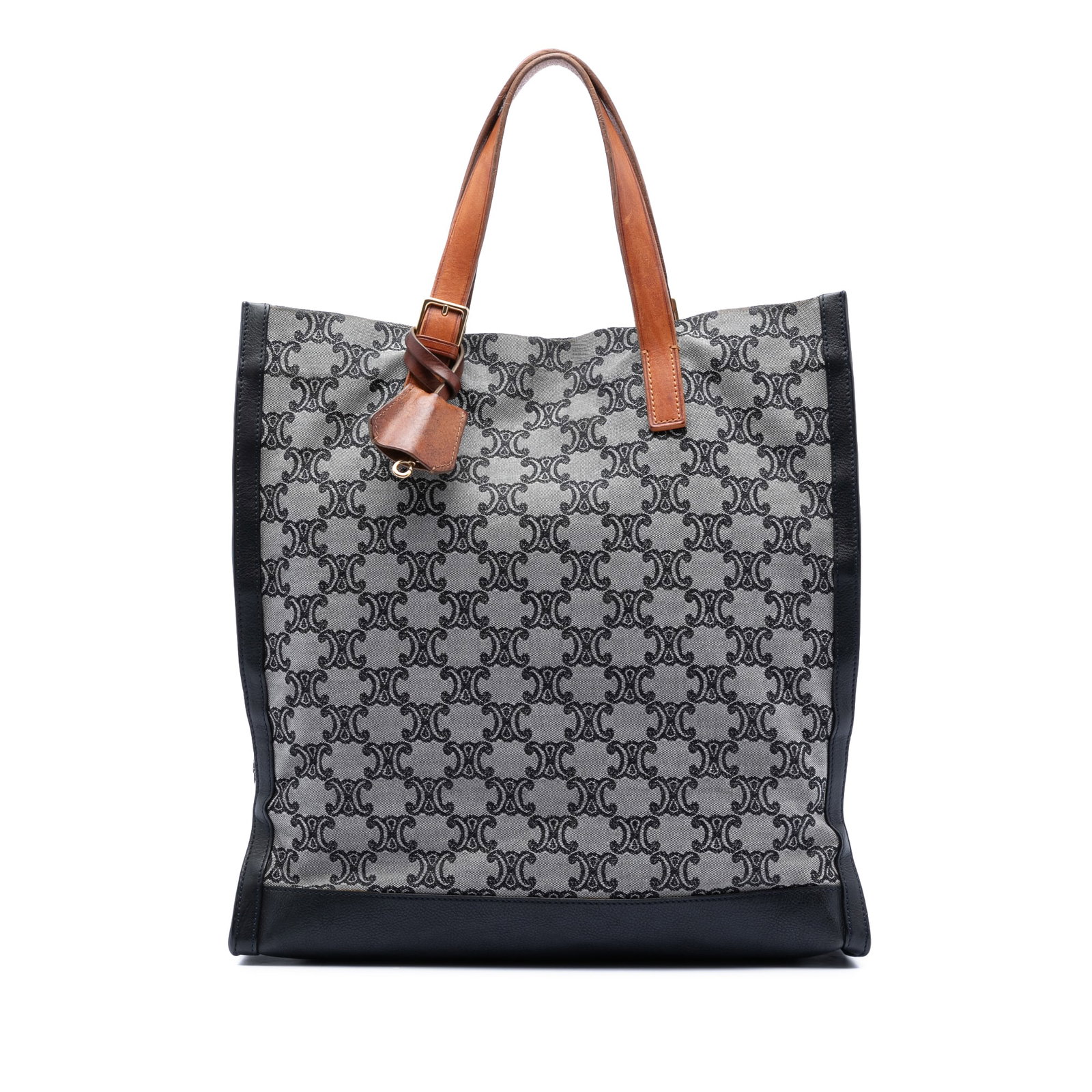 Celine Macadam Canvas Tote Bag with Leather Trim and Open Top: Celine Macadam Canvas Tote Bag with Leather Trim and Open Top This Celine Macadam Canvas Vertical Tote features a durable canvas body with leather trim, flat leather shoulder straps, an open top, and 