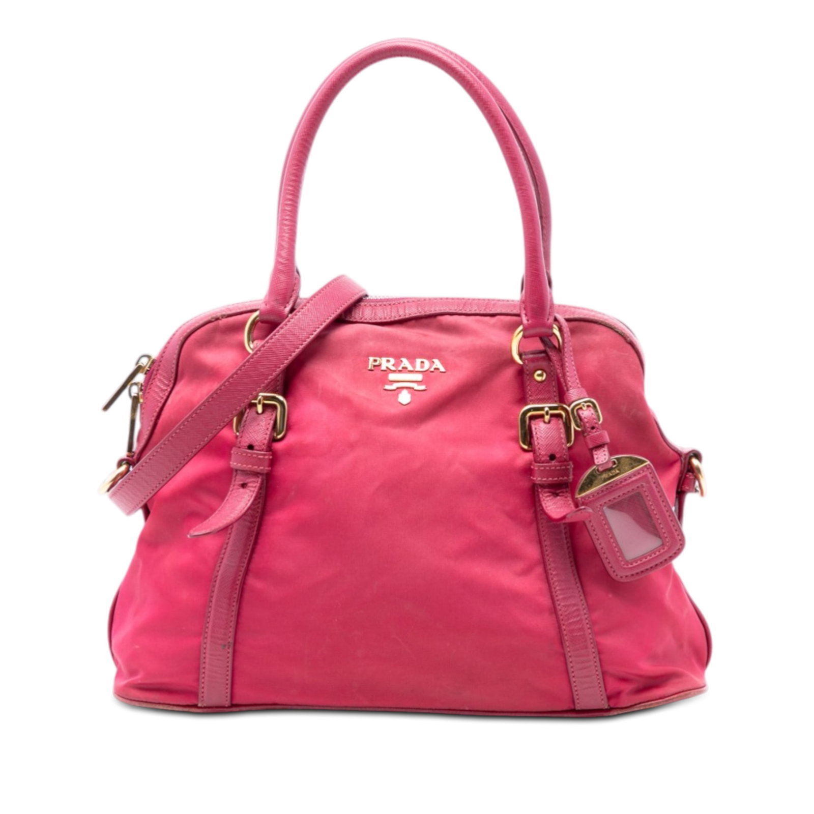 Prada Tessuto Satchel with Saffiano Leather Trim Pink: Prada Tessuto Satchel with Saffiano Leather Trim Pink This Prada Saffiano Trimmed Tessuto Dome Satchel features a pink nylon body with saffiano leather trim and rolled saffiano leather handles. It inc