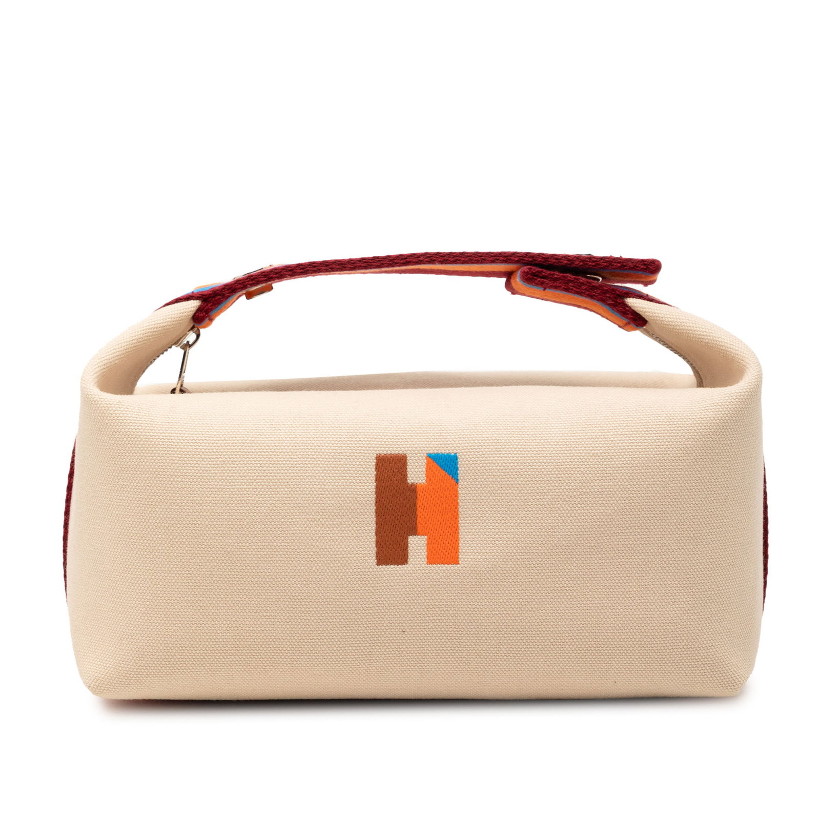 Hermes Pavillon toile bride-a-brac case: Hermes Pavillon toile bride-a-brac case The Hermes Small Toile Bride A Brac H Pavillon Case is crafted from durable fabric in a brown hue and features a canvas body with a flat canvas handle. The case