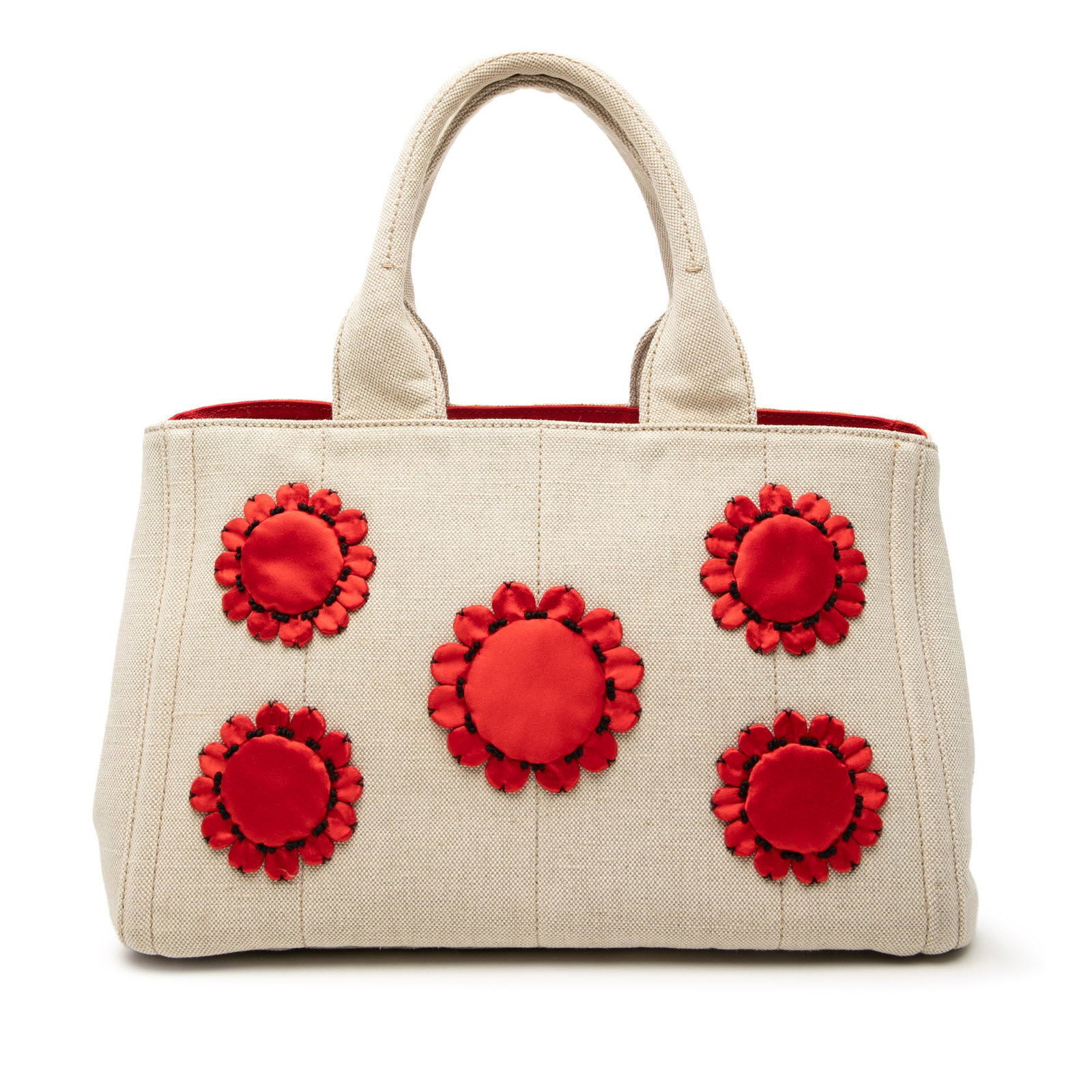 Prada Canapa Mistolino Tote with Satin Floral Canvas Design: Prada Canapa Mistolino Tote with Satin Floral Canvas Design This Prada Canvas Canapa Mistolino Tote features a fabric construction with satin floral details, rolled handles, an open top, and interior 