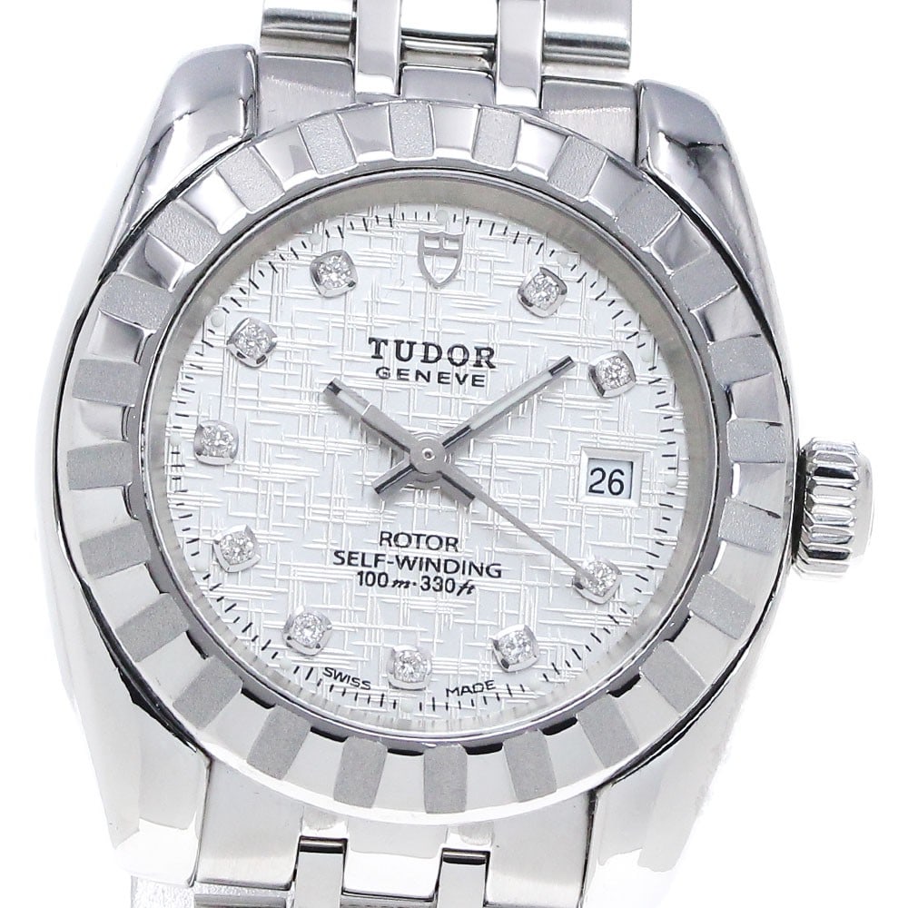 TUDOR Classic Date 22010 Ladies Automatic Stainless Steel Watch: TUDOR Classic Date 22010 Ladies Automatic Stainless Steel Watch This pre-owned TUDOR Classic Date Automatic women's wristwatch features a stainless steel case and bracelet with a silver dial. The watc