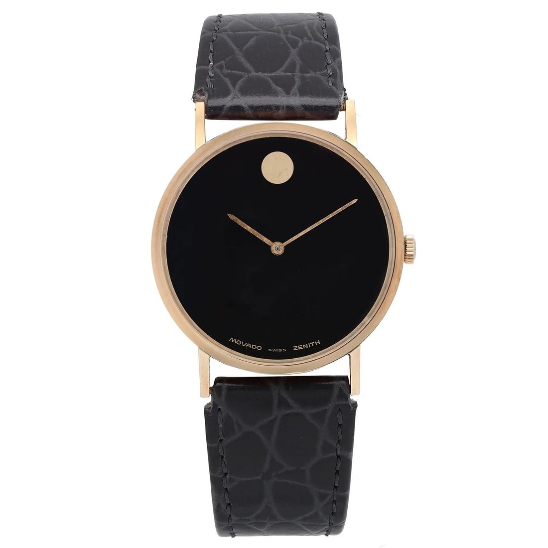 Vintage 33mm 14K Gold Movado Museum Black Dial Manual Wind Wristwatch: Vintage 33mm 14K Gold Movado Museum Black Dial Manual Wind Wristwatch This vintage Movado Museum Classic wristwatch features a 33mm solid 14K yellow gold case with a polished finish and a striking bla
