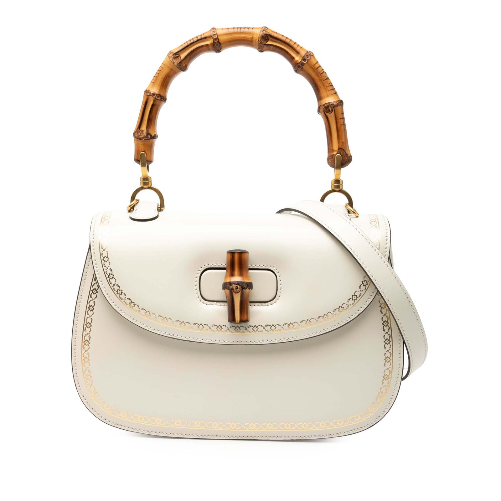 Gucci Leather Satchel with Bamboo Handle and Frame Print: Gucci Leather Satchel with Bamboo Handle and Frame Print This Gucci satchel features a printed leather body, a distinctive bamboo top handle, a detachable flat strap, a front flap with a bamboo twist 