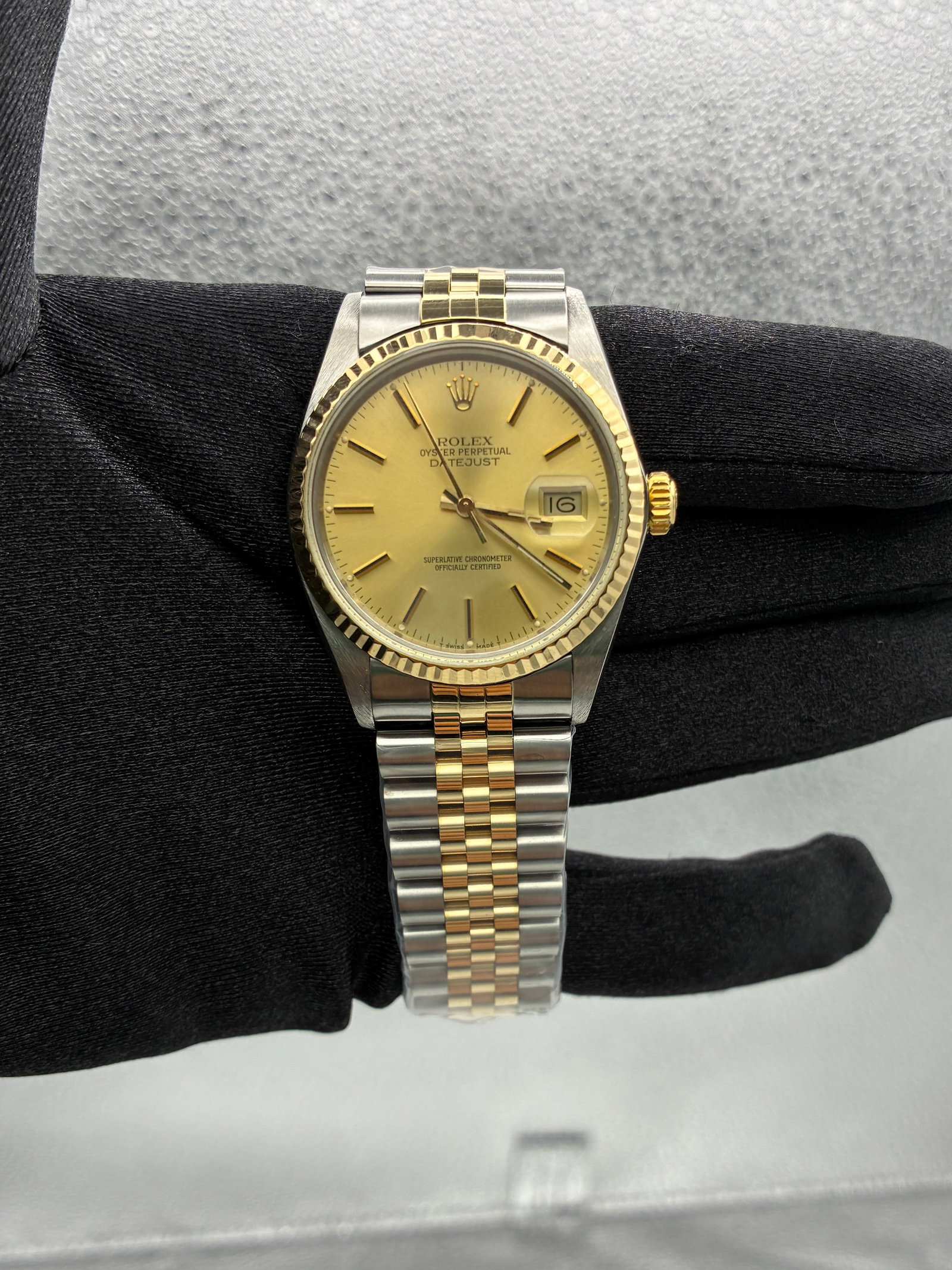 Rolex Datejust 16013 Champagne Stick Dial Aftermarket Jubilee Bracelet: Rolex Datejust 16013 Champagne Stick Dial Aftermarket Jubilee Bracelet This Rolex Datejust features a champagne stick dial and is fitted with an aftermarket Jubilee bracelet. The watch includes a flut