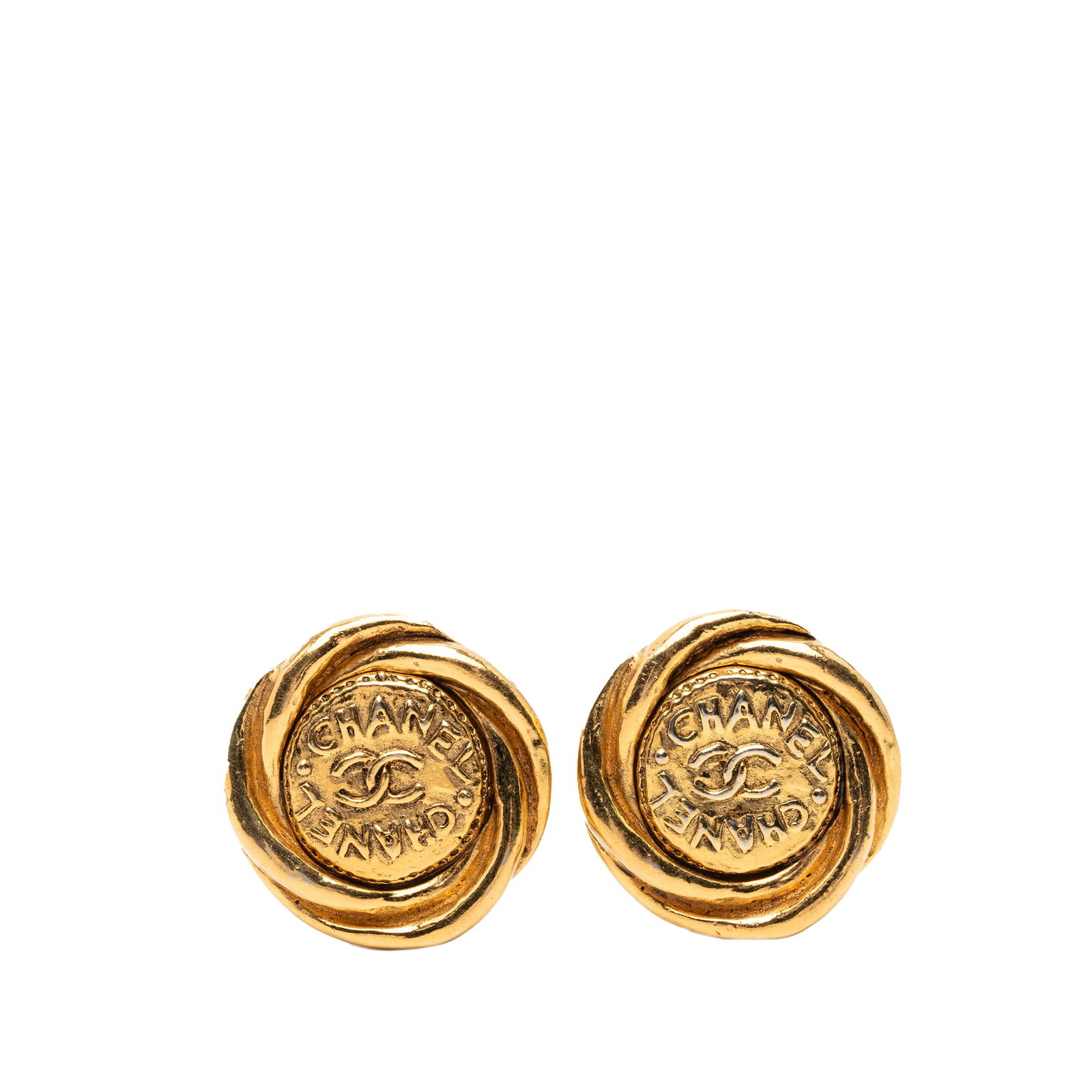 Chanel CC Gold Tone Clip On Round Earrings: Chanel CC Gold Tone Clip On Round Earrings These Chanel CC round clip-on earrings are crafted from gold tone metal and feature the iconic CC logo. Designed with back clip-on closures, they offer a cla